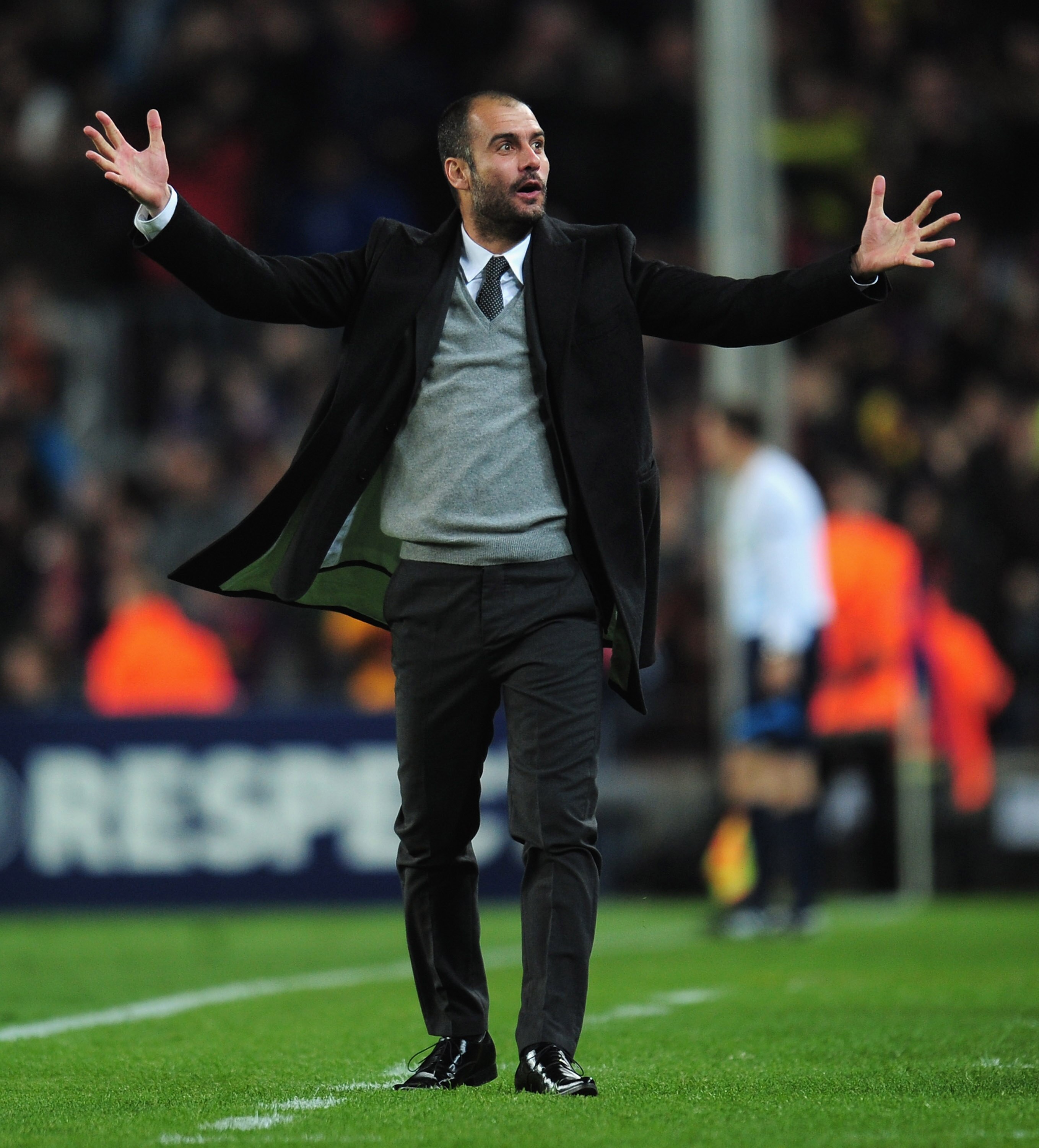 BARCELONA, SPAIN - MARCH 08:  Josep Guardiola the Barcelona coach celebrates  during the UEFA Champions League round of 16 second leg match between Barcelona and Arsenal at the Nou Camp Stadium on March 8, 2011 in Barcelona, Spain.  (Photo by Shaun Botter