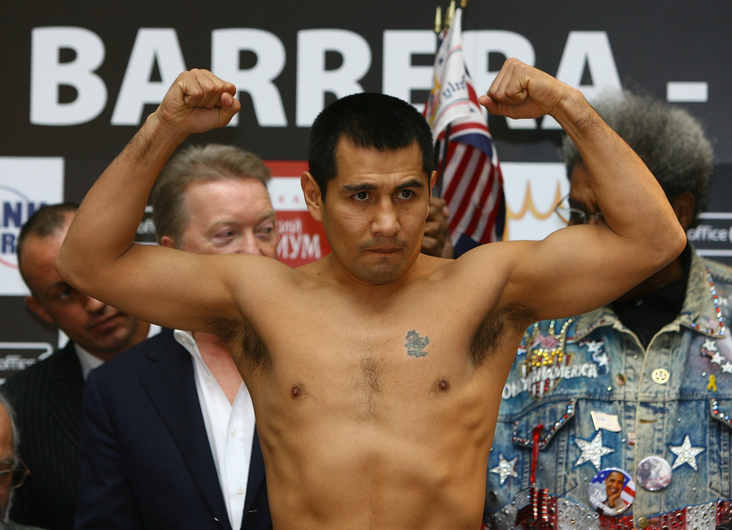 MANCHESTER, UNITED KINGDOM - MARCH 13:  Marco Antonio Barrera stands on the scales at the official weigh-in ahead of his fight with Amir Khan which was staged at the Triangle Shopping Centre on March 13, 2009 in Manchester, England. Amir Khan will fight t