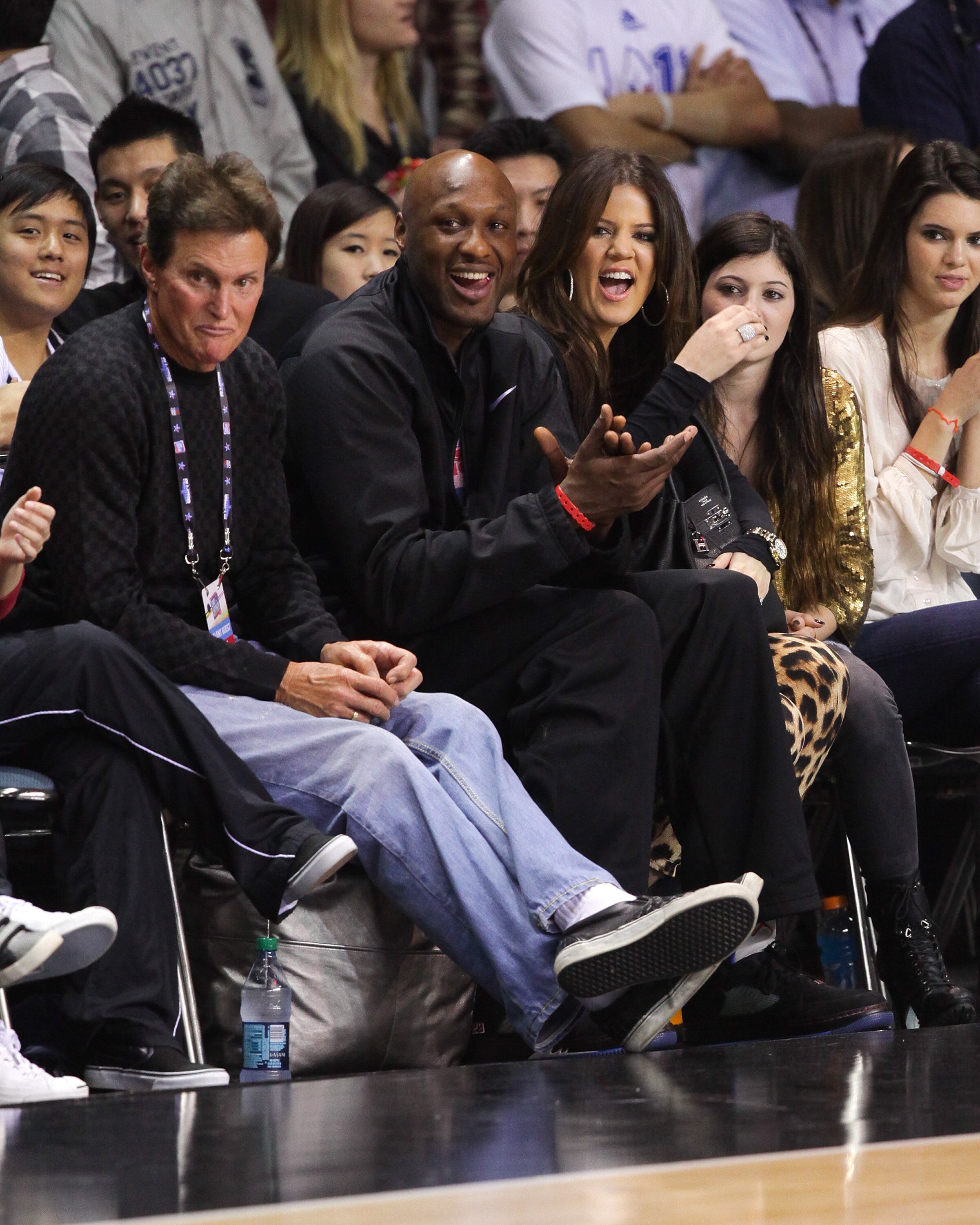 LOS ANGELES, CA - FEBRUARY 18:  (L-R) Bruce Jenner, Lamar Odom and Khloe Kardashian play at the 2011 BBVA NBA All-Star Celebrity Game at the Los Angeles Convention Center on February 18, 2011 in Los Angeles, California.  NOTE TO USER: User expressly ackno