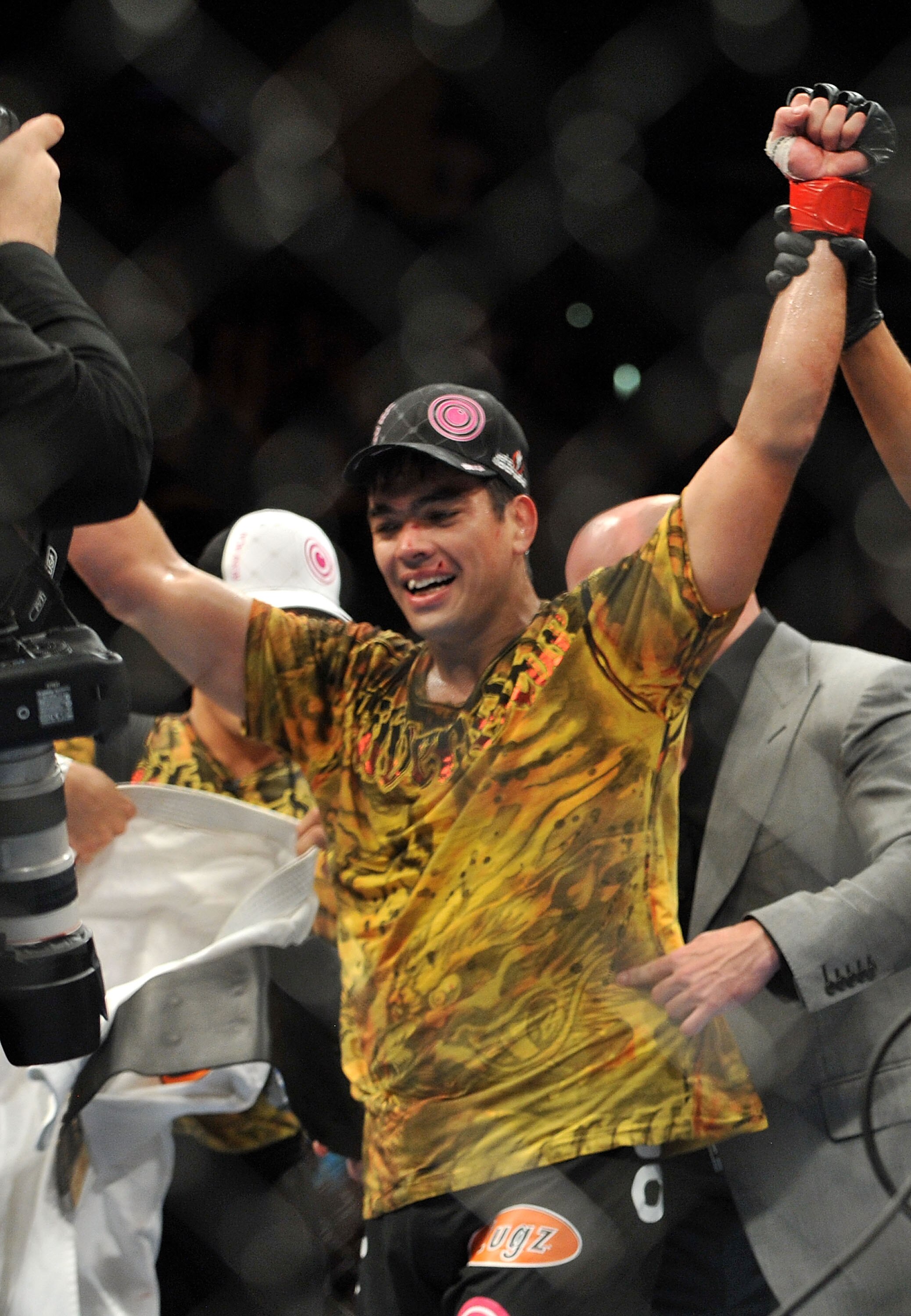 LOS ANGELES, CA - OCTOBER 24:  UFC Light Heavyweight Champion Lyoto Machida celebrates his victory over UFC Light Heavyweight challenger Mauricio Rua (not pictured) in their title fight at UFC 104 at Staples Center on October 24, 2009 in Los Angeles, Cali