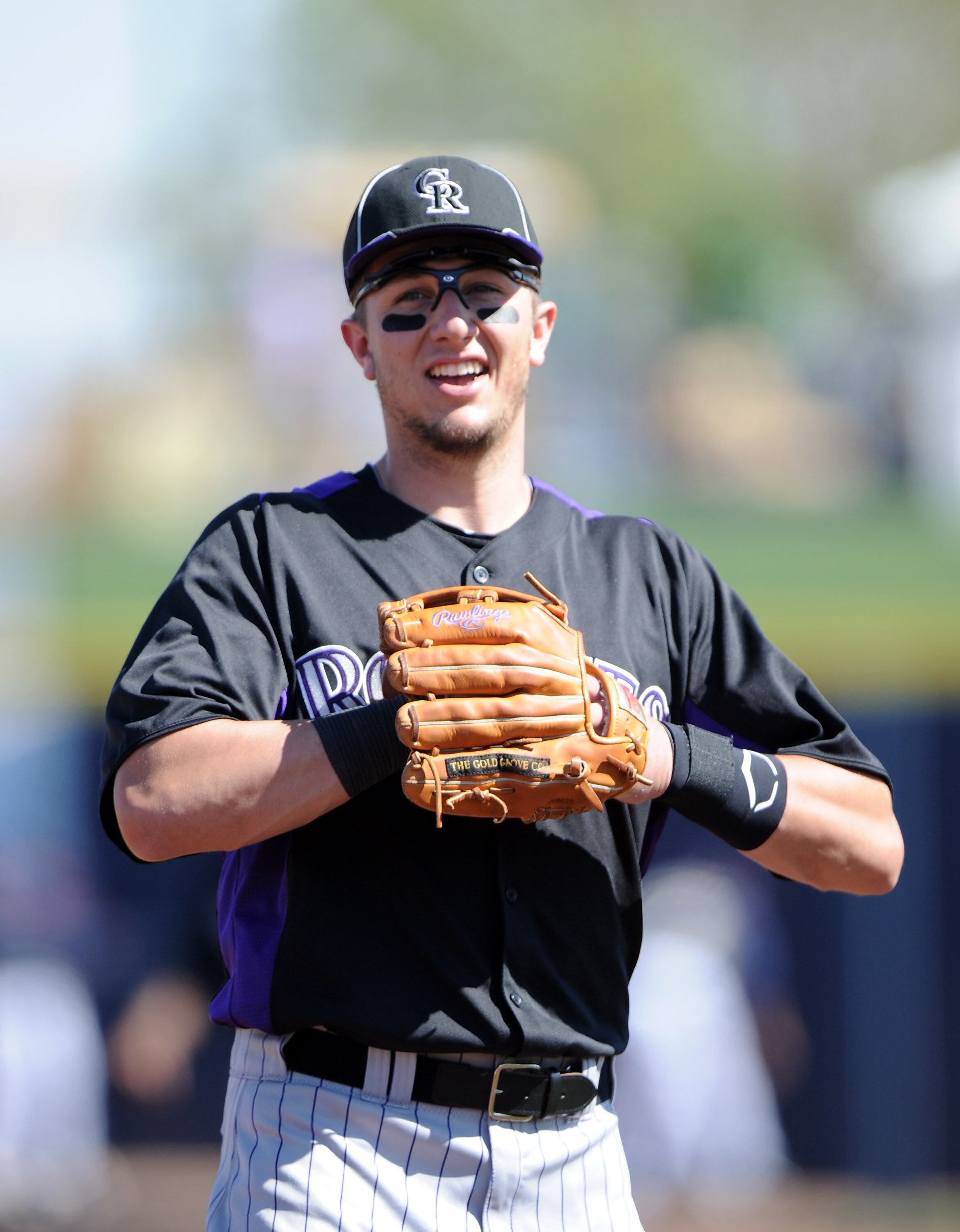 PEORIA, AZ - MARCH 02:  Troy Tulowitzki #2 of the Colorado Rockies smiles on the field against the San Diego Padres during spring training at Peoria Stadium on March 2, 2011 in Peoria, Arizona.  (Photo by Harry How/Getty Images)
