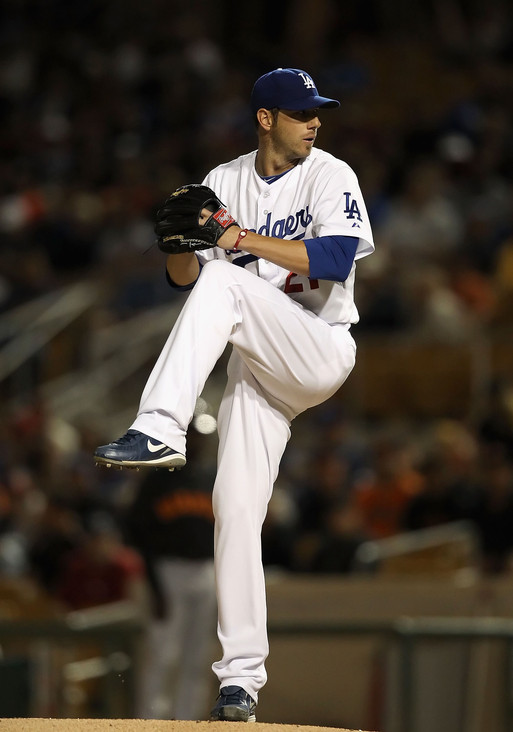 GLENDALE, AZ - MARCH 04:  Starting pticher Jon Garland #21 of the Los Angeles Dodgers pitches against the San Francisco Giants during the spring training game at Camelback Ranch on March 4, 2011 in Glendale, Arizona.  (Photo by Christian Petersen/Getty Im