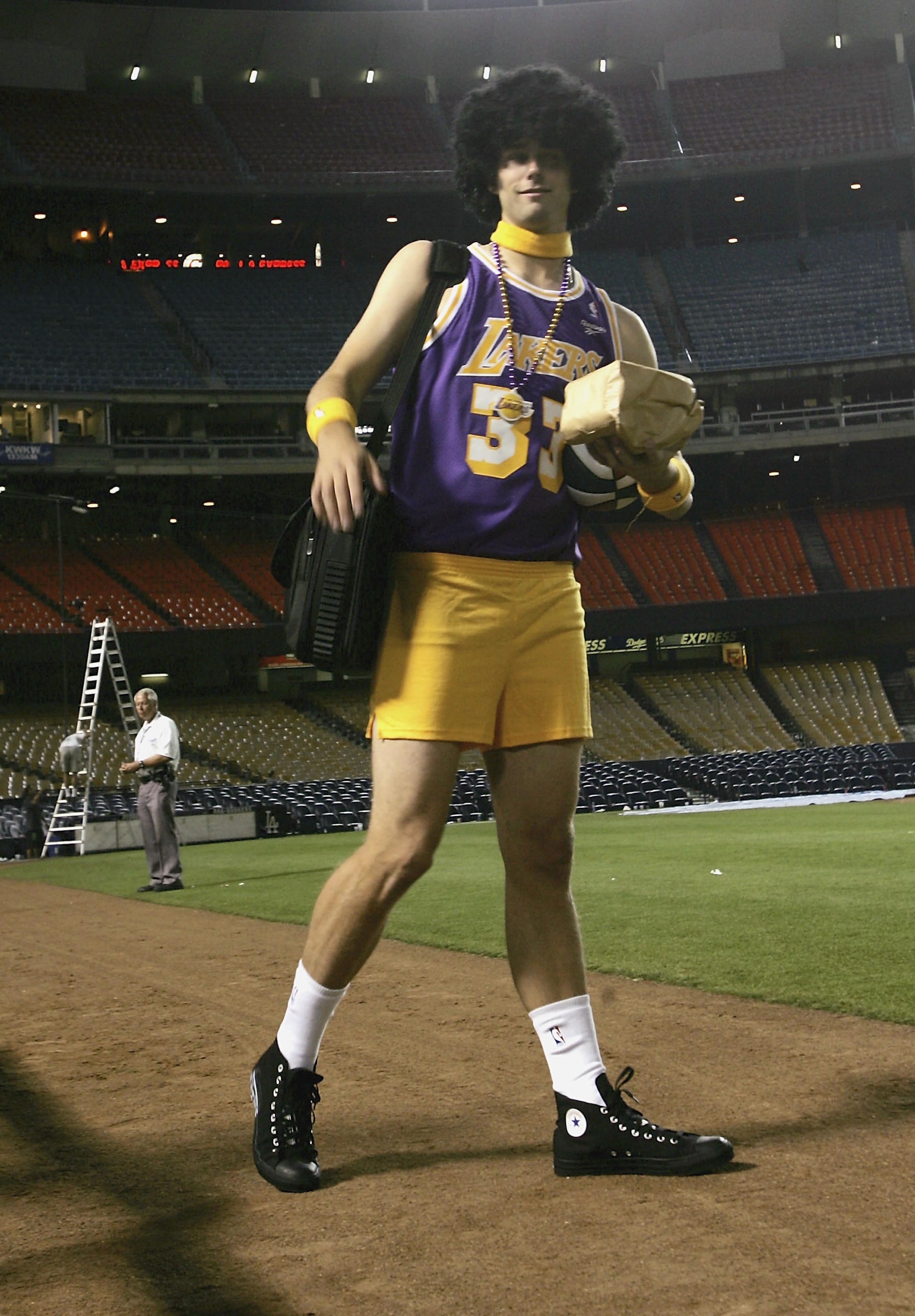 LOS ANGELES - SEPTEMBER 29:   Starting pitcher Dustin Nippert #57 of the Arizona Diamondbacks wears Laker clothes in traditional rookie hazing as he leaves the stadium after the game with the Los Angeles Dodgers on September 29, 2005 at Dodger Stadium in