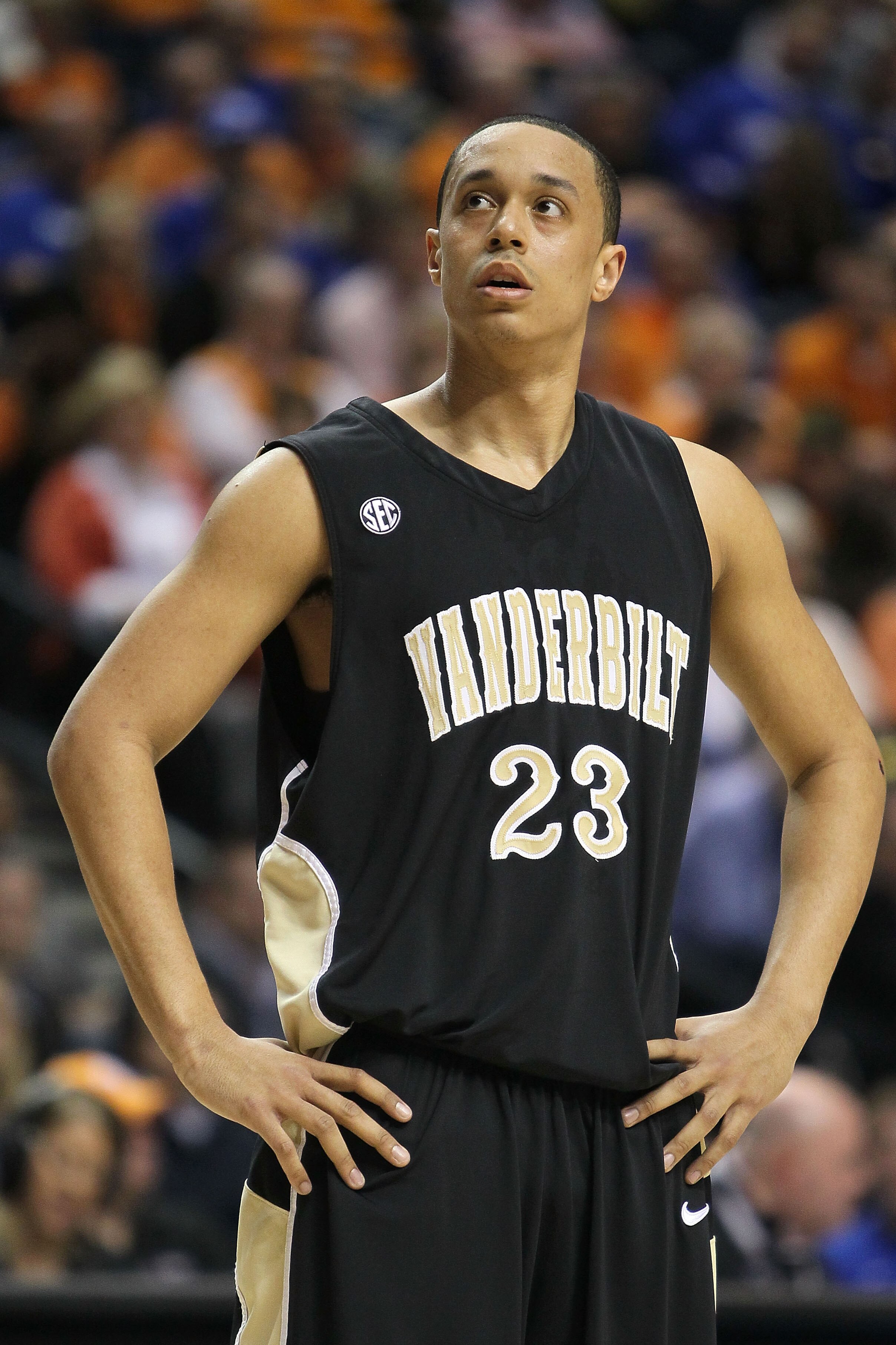 NASHVILLE, TN - MARCH 13:  John Jenkins #23 of the Vanderbilt Commodores looks on in the first half against the Mississippi State Bulldogs during the semirfinals of the SEC Men's Basketball Tournament at the Bridgestone Arena on March 13, 2010 in Nashvill