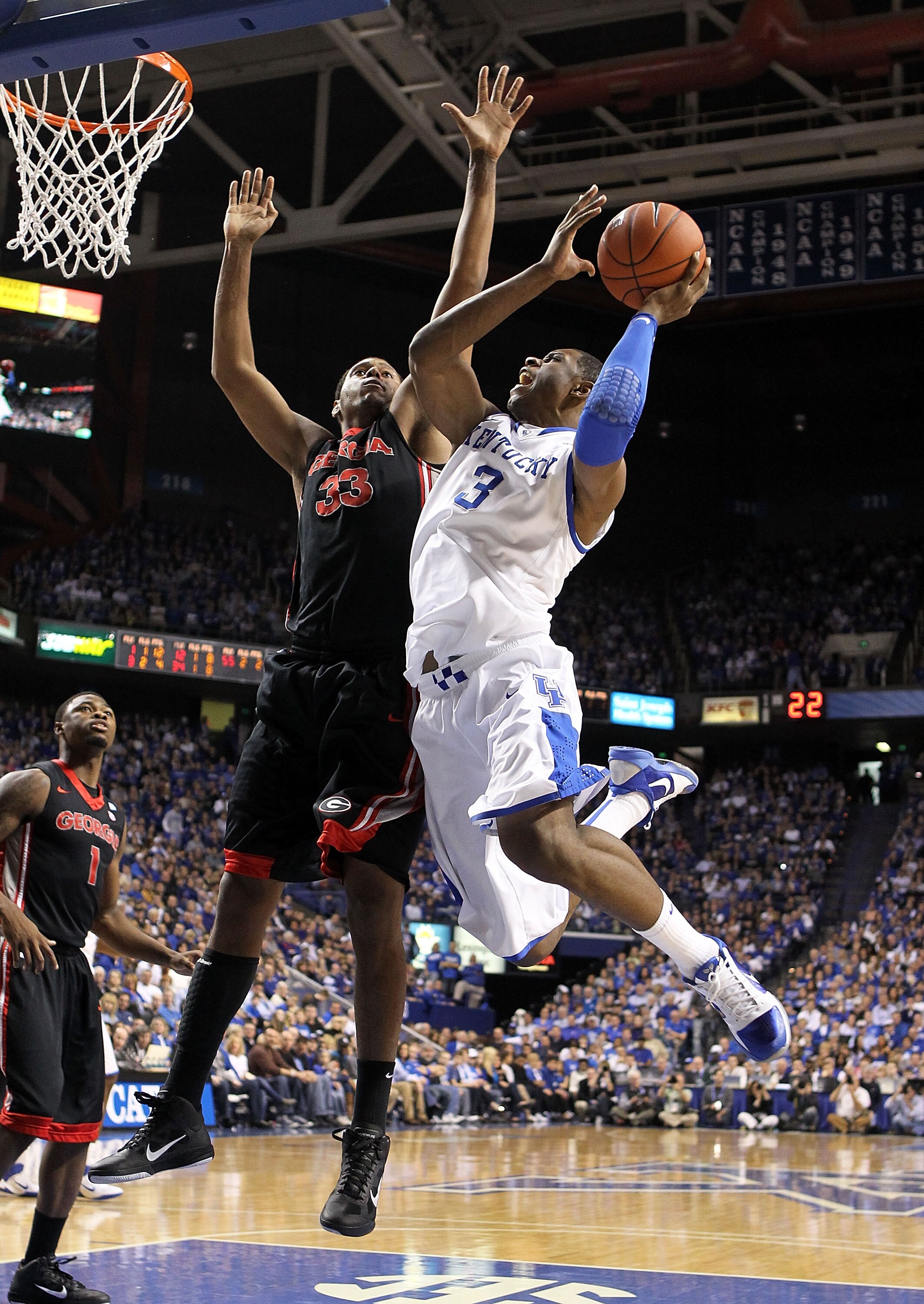 LEXINGTON, KY - JANUARY 29:  Terrence Jones #3 of the Kentucky Wildcats shoots the ball while defended by Trey Thompkins #33 of the Georgia Bulldogs during the SEC game at Rupp Arena on January 29, 2011 in Lexington, Kentucky. Kentucky won 66-60.  (Photo
