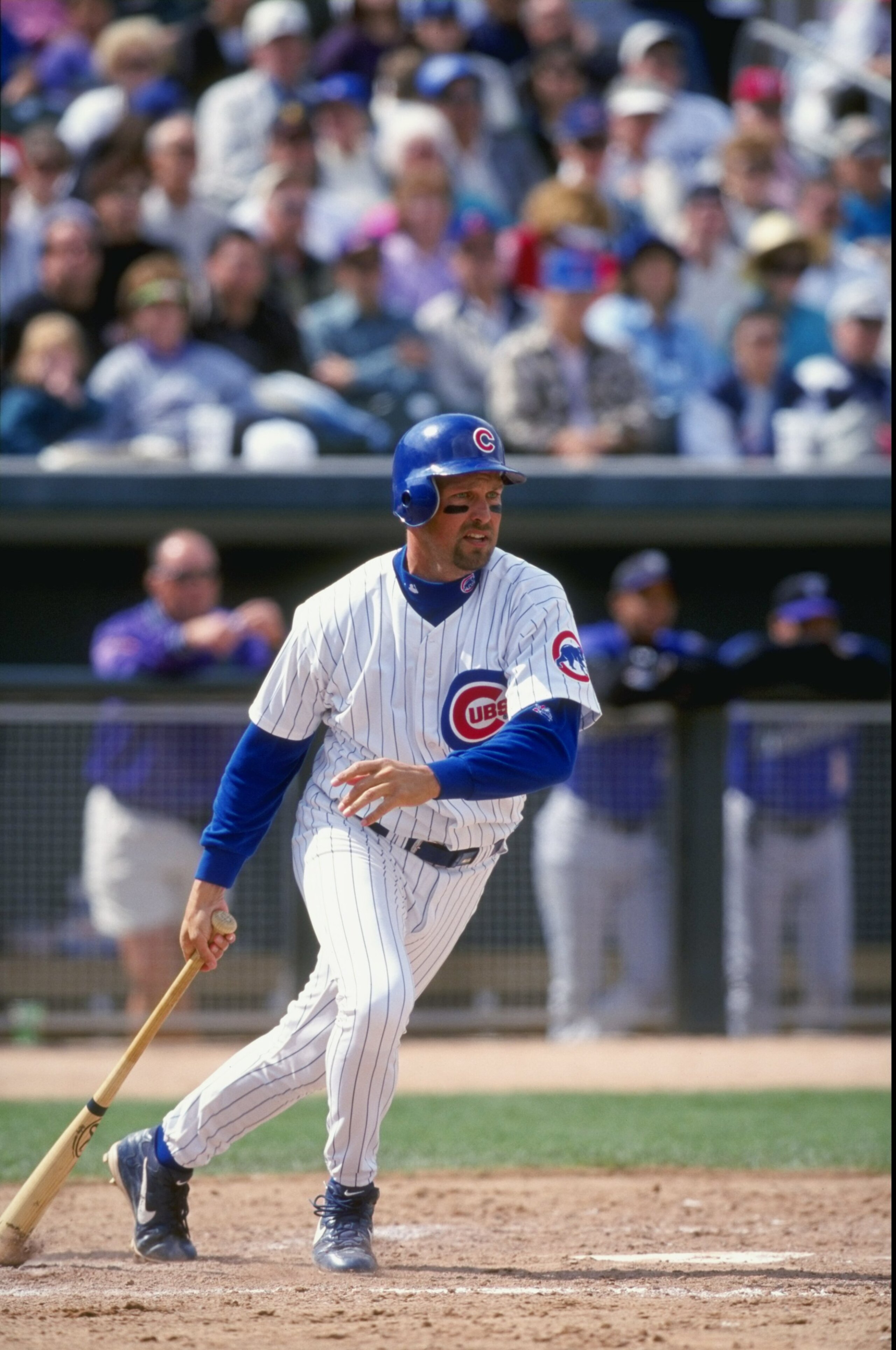 17 Mar 1999:  Infielder Mark Grace #17 of the Chicago Cubs drops the ball as the starts to run during the Spring Training game against the Arizona Diamondbacks at the HoHoKam Park in Mesa, Arizona. The Cubs defeated the Diamondbacks 6-5. Mandatory Credit: