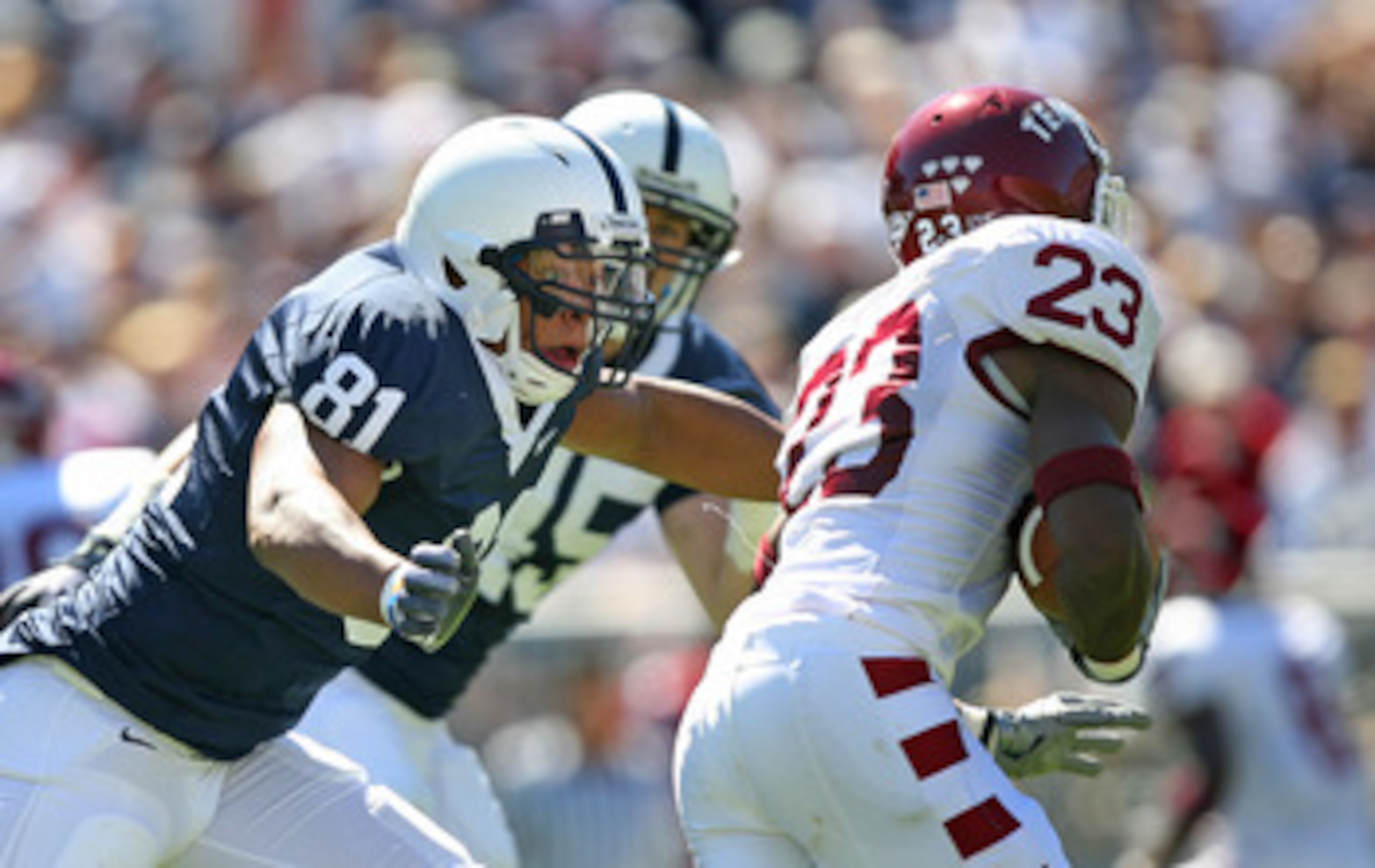 STATE COLLEGE, PA - SEPTEMBER 19: Defensive end Jack Crawford #81 of the Penn State Nittany Lions pursues wide receiver James Nixon #23 of the Temple Owls during a game on September 19, 2009 at Beaver Stadium in State College, Pennsylvania. (Photo by Hunt
