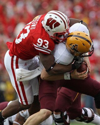 MADISON, WI - SEPTEMBER 18: Louis Nzegwu #93 of the Wisconsin Badgers sacks Steven Threet #14 of the Arizona State Sun Devils at Camp Randall Stadium on September 18, 2010 in Madison, Wisconsin.  Wisconsin defeated Arizona State 20-19. (Photo by Jonathan