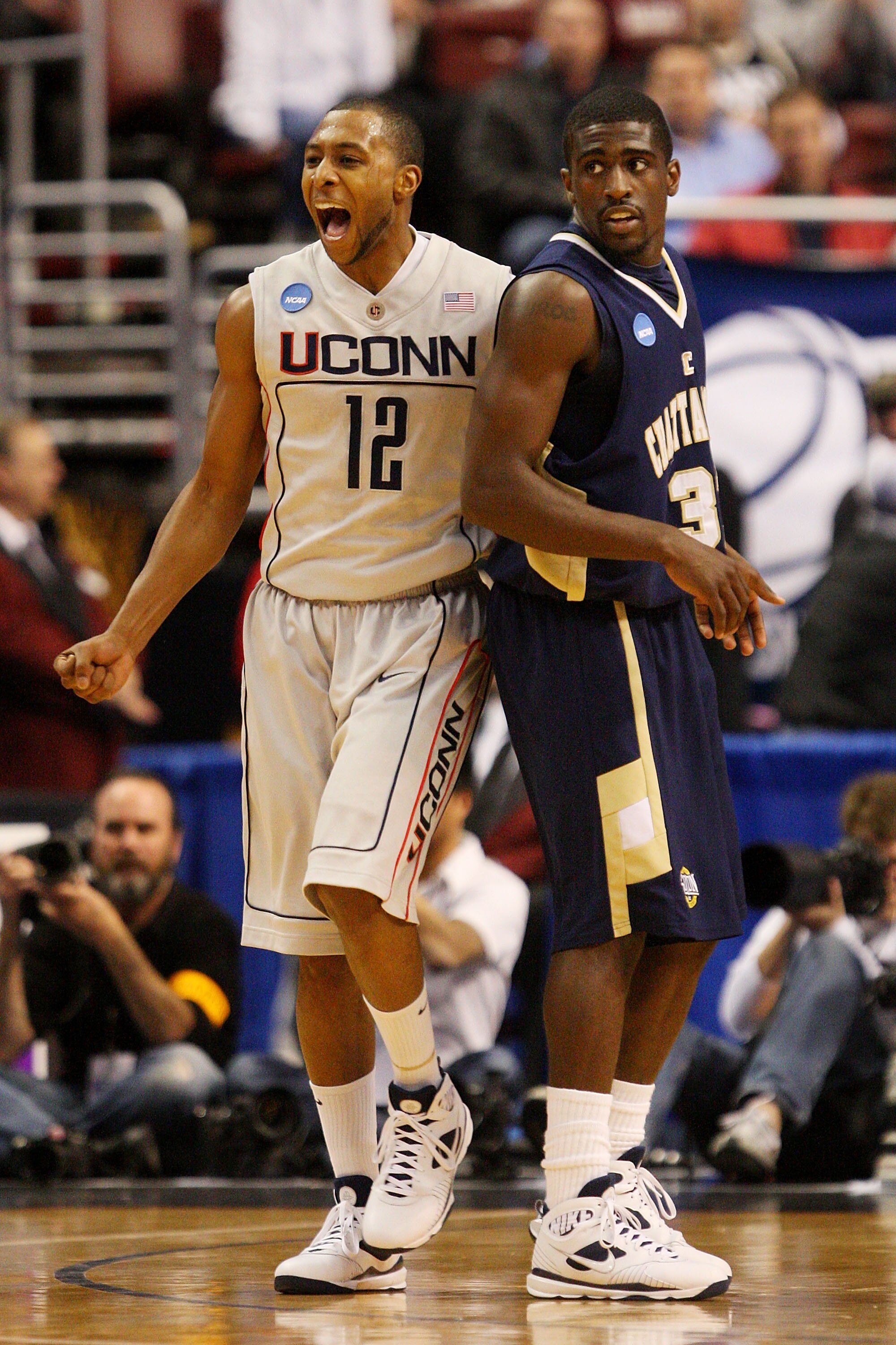 PHILADELPHIA - MARCH 19:  A.J. Price #12 of the Connecticut Huskies reacts during the game against the Chattanooga Mocs during the first round of the NCAA Division I Men's Basketball Tournament at the Wachovia Center on March 19, 2009 in Philadelphia, Pen