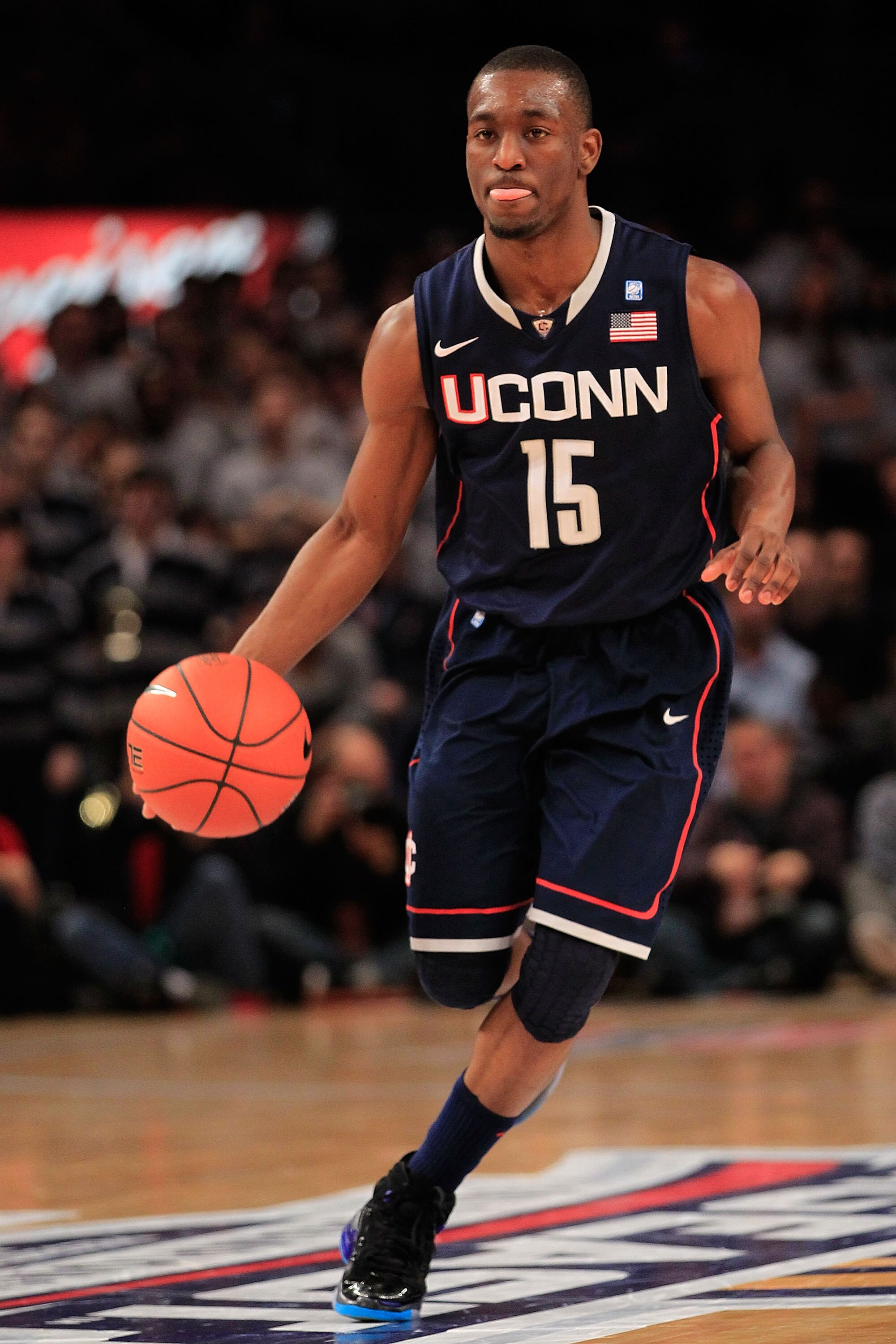 NEW YORK, NY - MARCH 09: Kemba Walker #15 of the Connecticut Huskies dribbles the ball against the Georgetown Hoyas during the second round of the 2011 Big East Men's Basketball Tournament presented by American Eagle Outfitters at Madison Square Garden o NEW YORK, NY - MARCH 09: Kemba Walker #15 of the Connecticut Huskies dribbles the ball against the Georgetown Hoyas during the second round of the 2011 Big East Men's Basketball Tournament presented by American Eagle Outfitters at Madison Square Garden o
