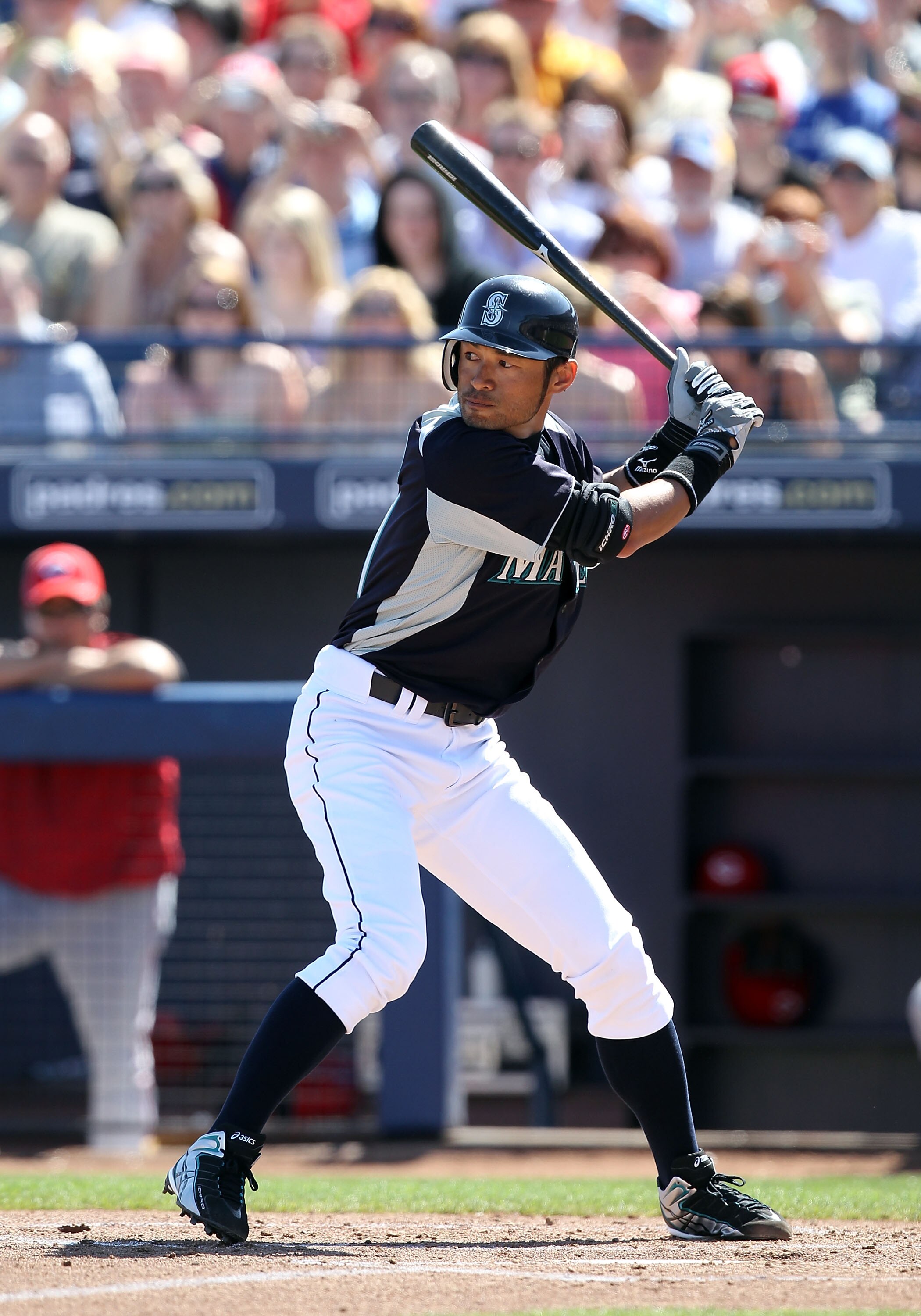 PEORIA, AZ - MARCH 04:  Ichiro Suzuki #51 of the Seattle Mariners bats against the Cincinnati Reds during the spring training game at Peoria Stadium on March 4, 2011 in Peoria, Arizona.  (Photo by Christian Petersen/Getty Images)