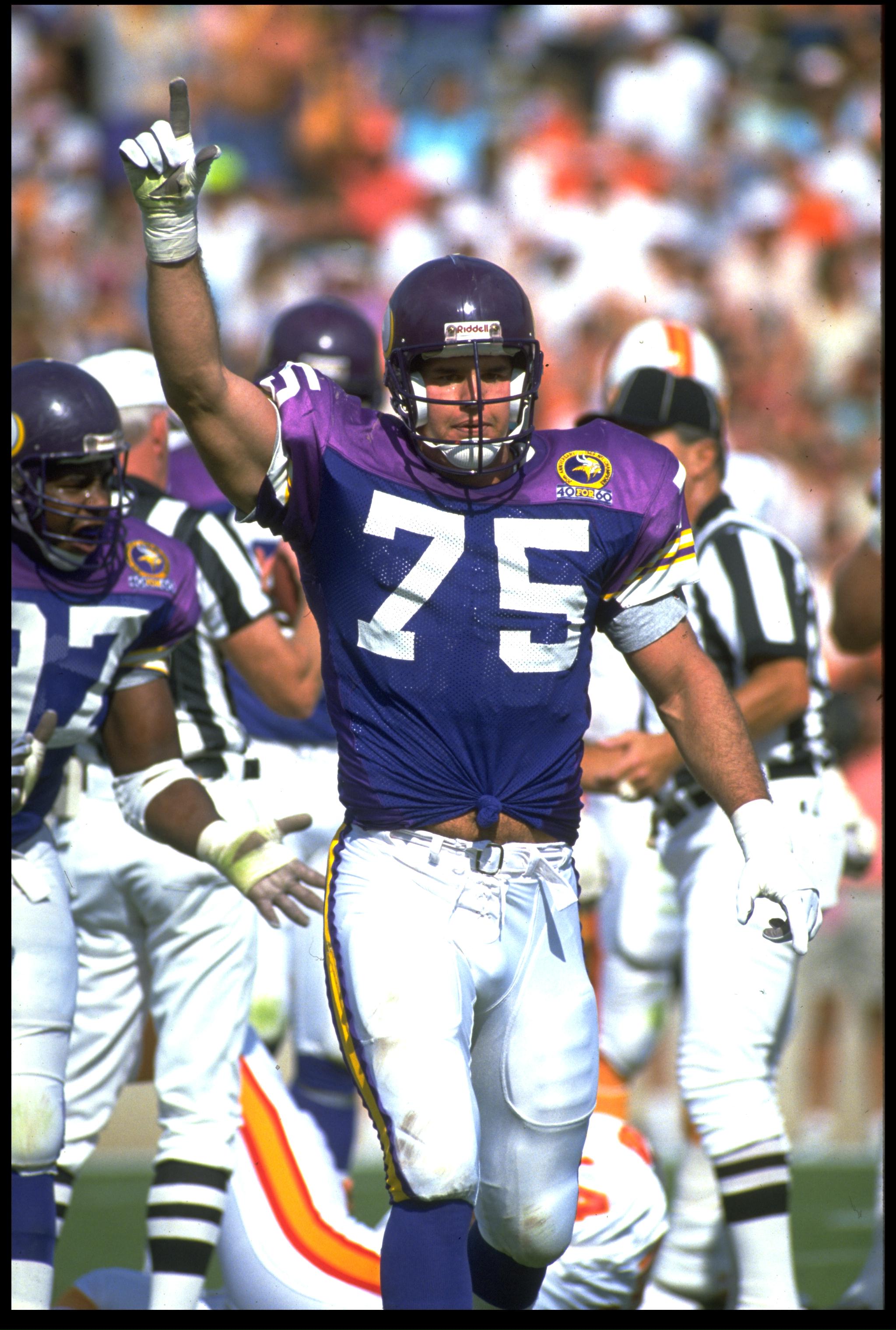 12 NOV 1989:  MINNESOTA VIKINGS DEFENSIVE LINEMAN KEITH MILLARD CELEBRATES DURING THE VIKINGS 24-10 WIN OVER THE TAMPA BAY BUCCANEERS AT TAMPA BAY STADIUM IN TAMPA BAY, FLORIDA.  MANDATORY CREDIT:  SCOTT HALLERAN /ALLSPORT