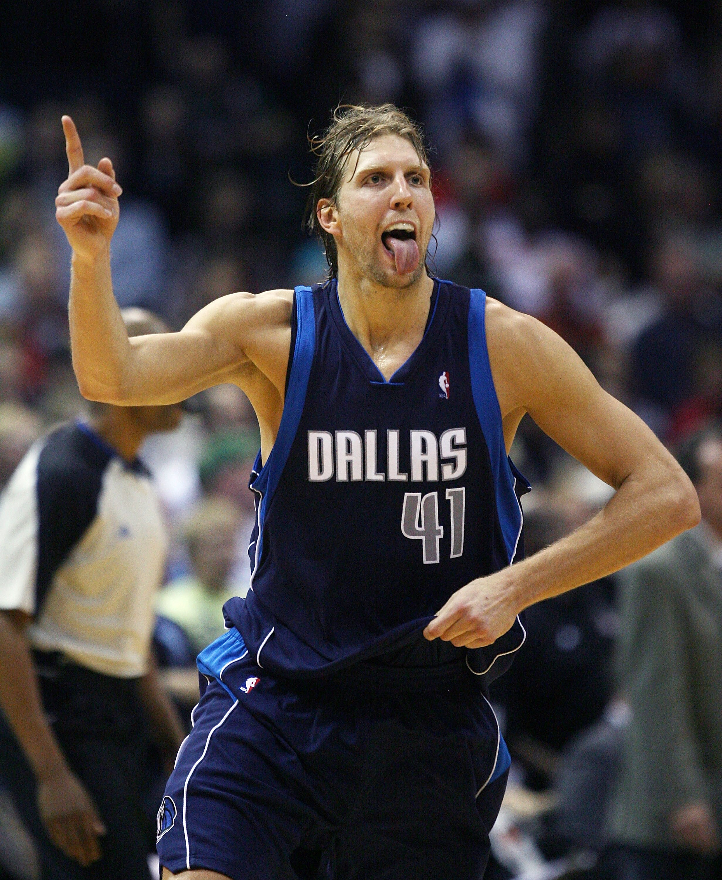 MILWAUKEE - NOVEMBER 16: Dirk Nowitzki #41 of the Dallas Mavericks celebrates hitting the game-winning shot with 3.3 seconds on the clock against the Milwaukee Bucks at the Bradley Center on November 16, 2009 in Milwaukee, Wisconsin. The Mavericks defeate
