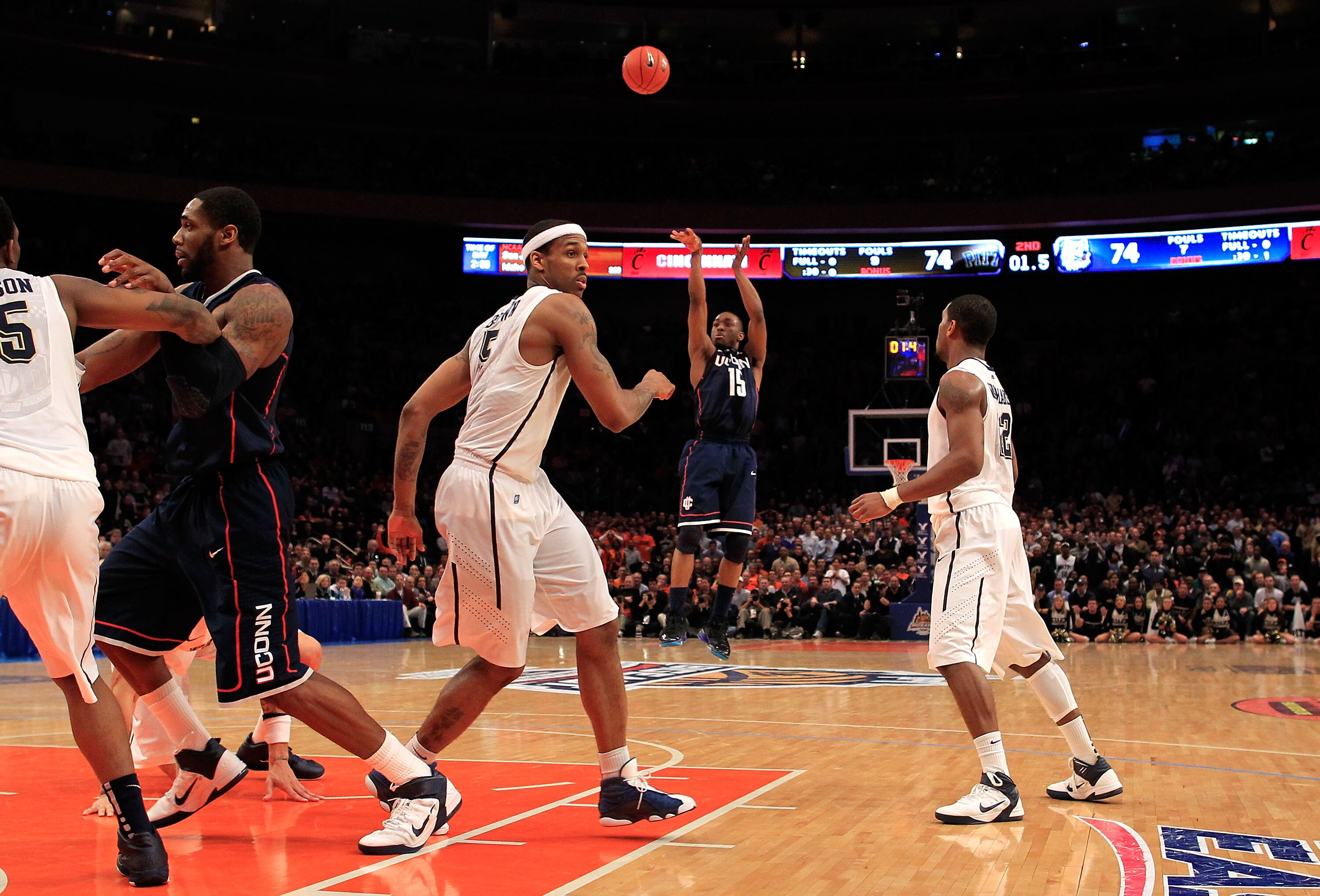 NEW YORK, NY - MARCH 10:  Kemba Walker #15 of the Connecticut Huskies shoots a game winning basket against the Pittsburgh Panthers during the quarterfinals of the 2011 Big East Men's Basketball Tournament presented by American Eagle Outfitters  at Madison