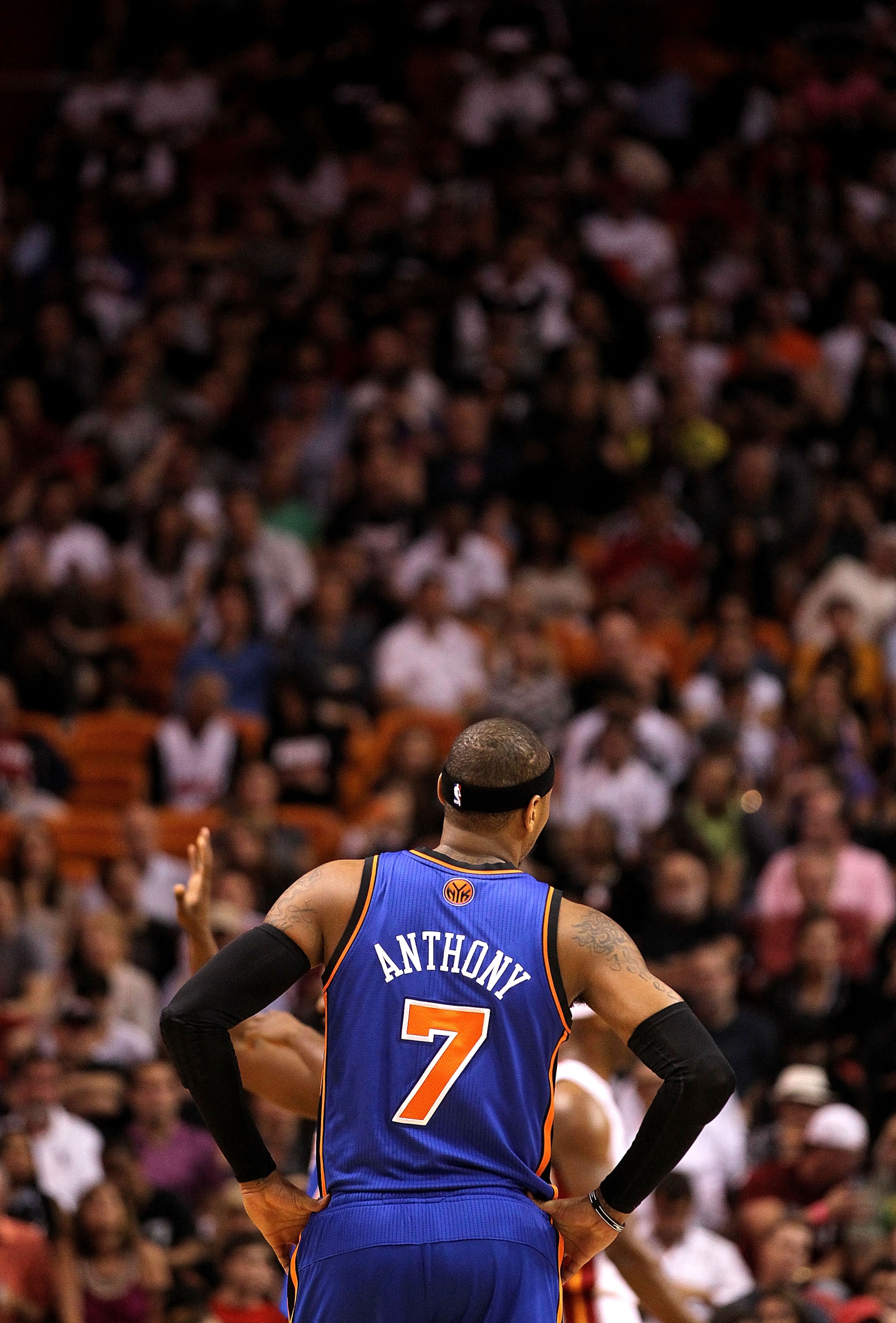 MIAMI, FL - FEBRUARY 27: Carmelo Anthony #7 of the New York Knicks looks on during a foul shot during a game gainst the Miami Heat at American Airlines Arena on February 27, 2011 in Miami, Florida. NOTE TO USER: User expressly acknowledges and agrees tha MIAMI, FL - FEBRUARY 27: Carmelo Anthony #7 of the New York Knicks looks on during a foul shot during a game gainst the Miami Heat at American Airlines Arena on February 27, 2011 in Miami, Florida. NOTE TO USER: User expressly acknowledges and agrees tha
