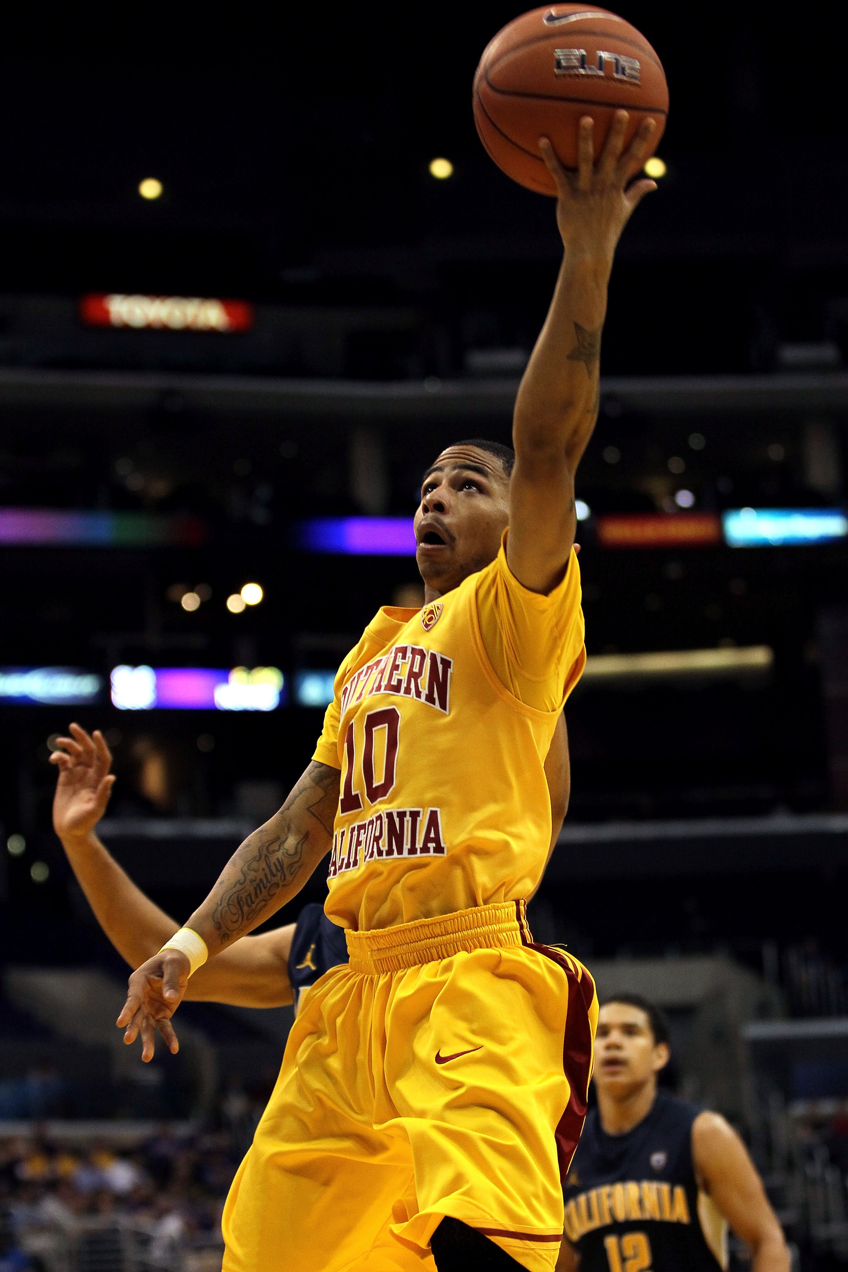 LOS ANGELES, CA - MARCH 10:  Maurice Jones #10 of the USC Trojans lays the ball up in the second half against the California Golden Bears in the quarterfinals of the 2011 Pacific Life Pac-10 Men's Basketball Tournament at Staples Center on March 10, 2011