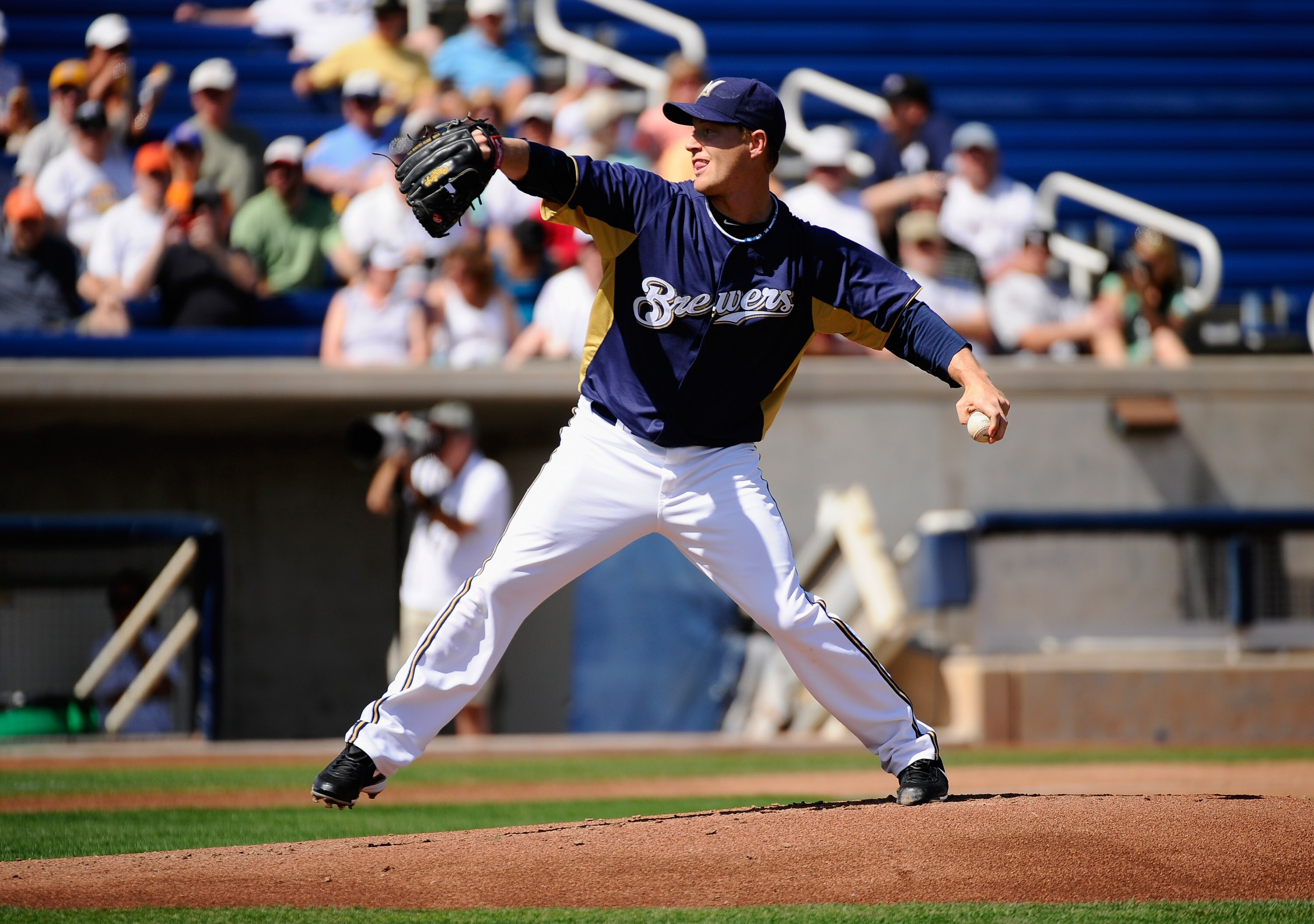 PHOENIX, AZ - MARCH 10:  Chris Narveson #38 pitcher of the Milwaukee Brewers throws a pitch against the Colorado Rockies during the spring training baseball game at Maryvale Baseball Park on March 10, 2011 in Phoenix, Arizona.  (Photo by Kevork Djansezian