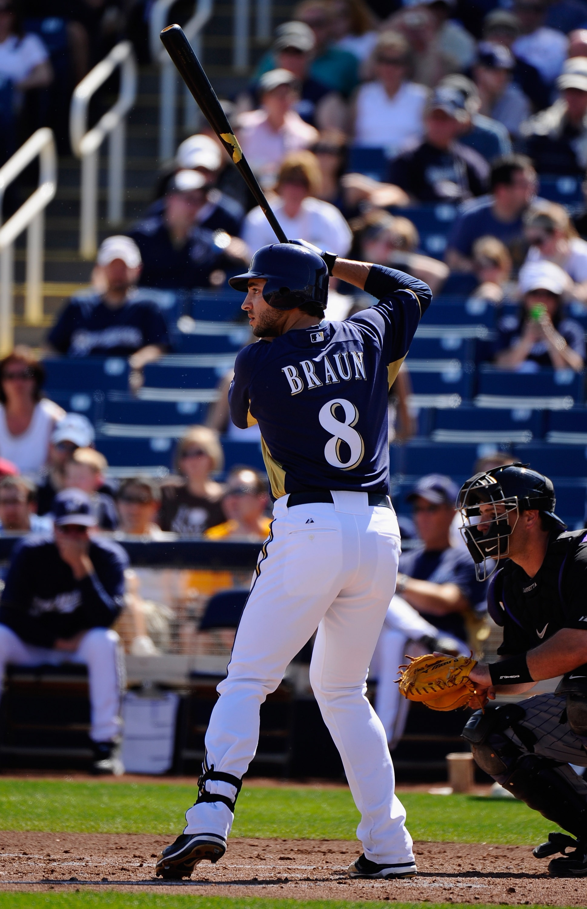 PHOENIX, AZ - MARCH 10:  Ryan Braun #8 of the Milwaukee Brewers swings the bat against the Colorado Rockies during the spring training baseball game at Maryvale Baseball Park on March 10, 2011 in Phoenix, Arizona.  (Photo by Kevork Djansezian/Getty Images