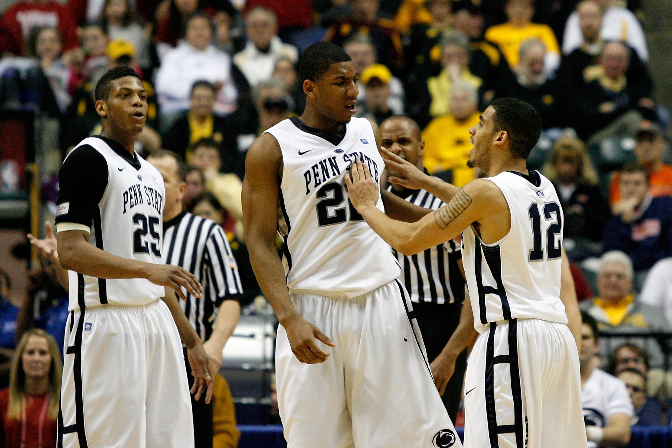 INDIANAPOLIS, IN - MARCH 10:  (L-R) Jeff Brooks #25, Andrew Jones #22 and Talor Battle #12 of the Penn State Nittany Lions react against the Indiana Hoosiers during the first round of the 2011 Big Ten Men's Basketball Tournament at Conseco Fieldhouse on M