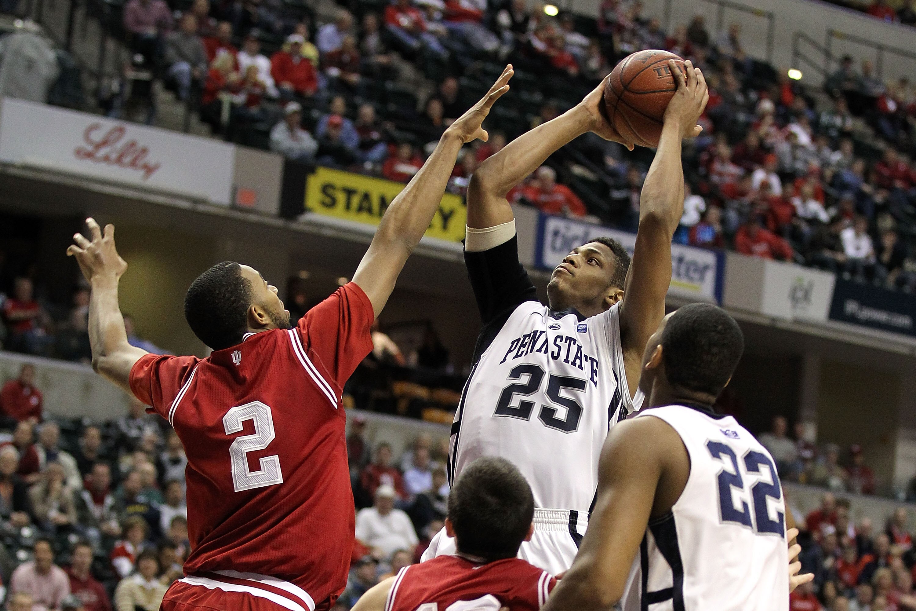 INDIANAPOLIS, IN - MARCH 10:  Jeff Brooks #25 of the Penn State Nittany Lions attempts a shot against Christian Watford #2 of the Indiana Hoosiers during the first round of the 2011 Big Ten Men's Basketball Tournament at Conseco Fieldhouse on March 10, 20