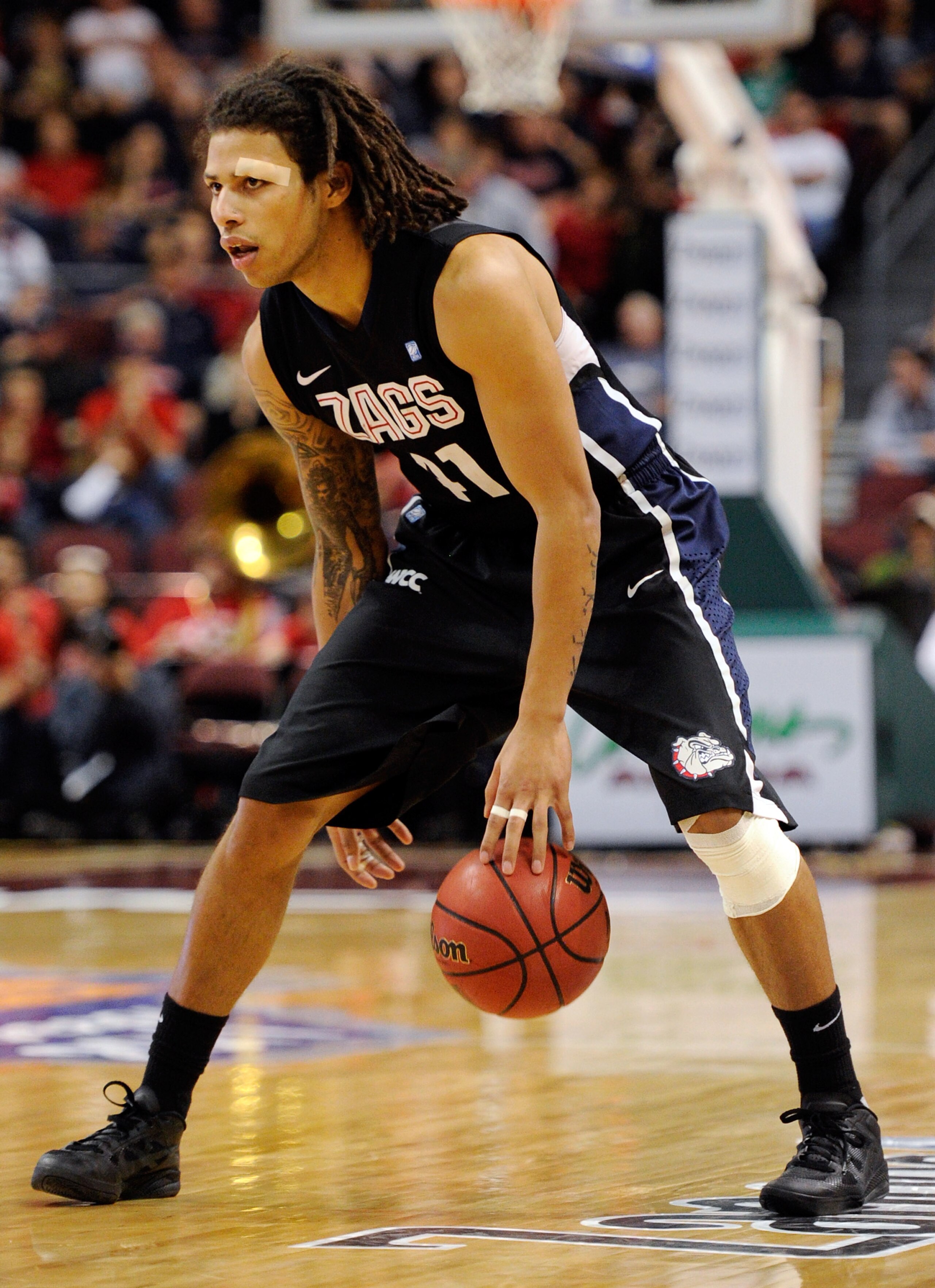 LAS VEGAS, NV - MARCH 07:  Steven  Gray #41 of the Gonzaga Bulldogs brings the ball up the court against the Saint Mary's Gaels during the championship game of the Zappos.com West Coast Conference Basketball tournament at the Orleans Arena March 7, 2011 i