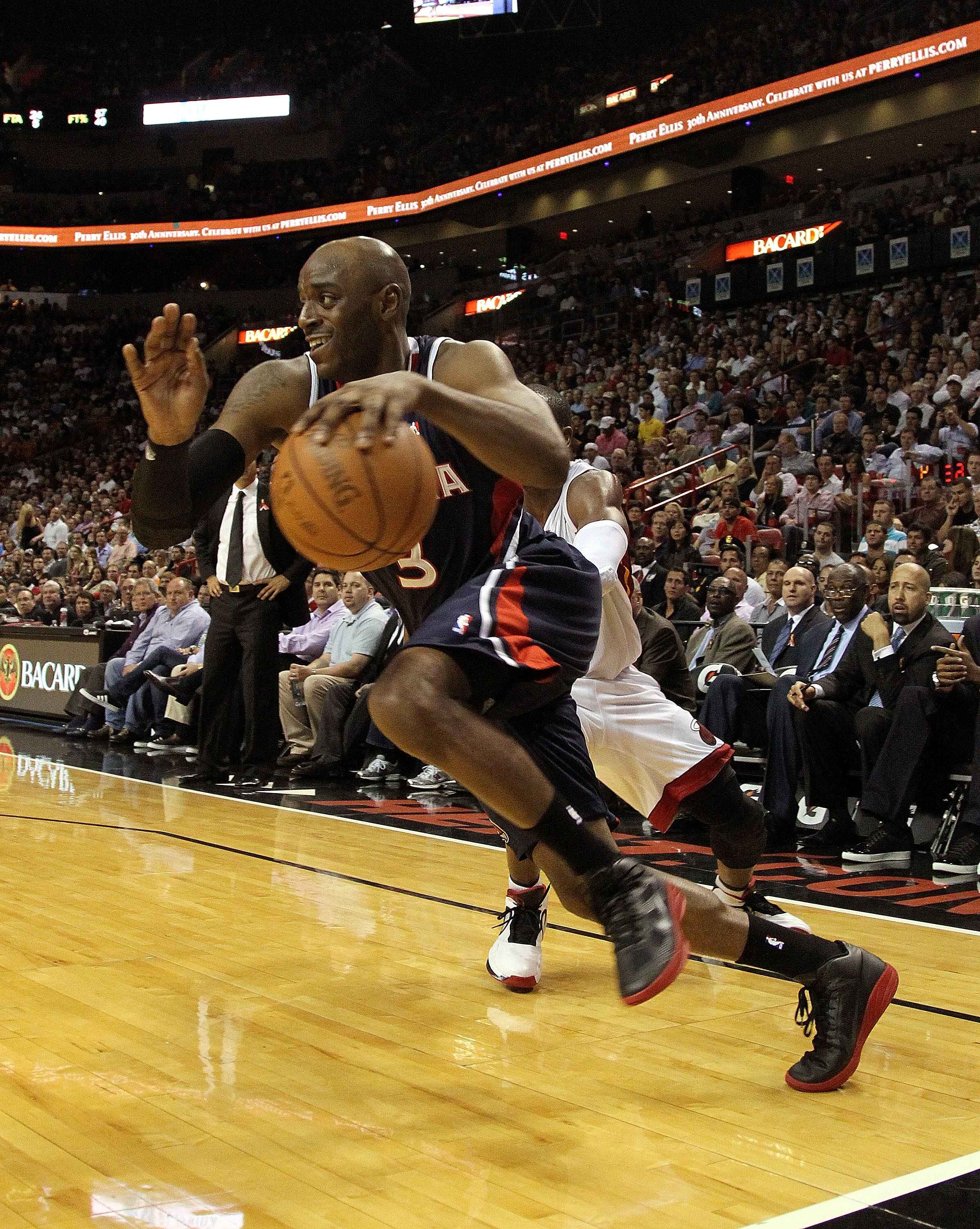 MIAMI, FL - JANUARY 18: Damien Wilkins #3 of the Atlanta Hawks drives to the lane during a game against the Miami Heat at American Airlines Arena on January 18, 2011 in Miami, Florida. NOTE TO USER: User expressly acknowledges and agrees that, by download