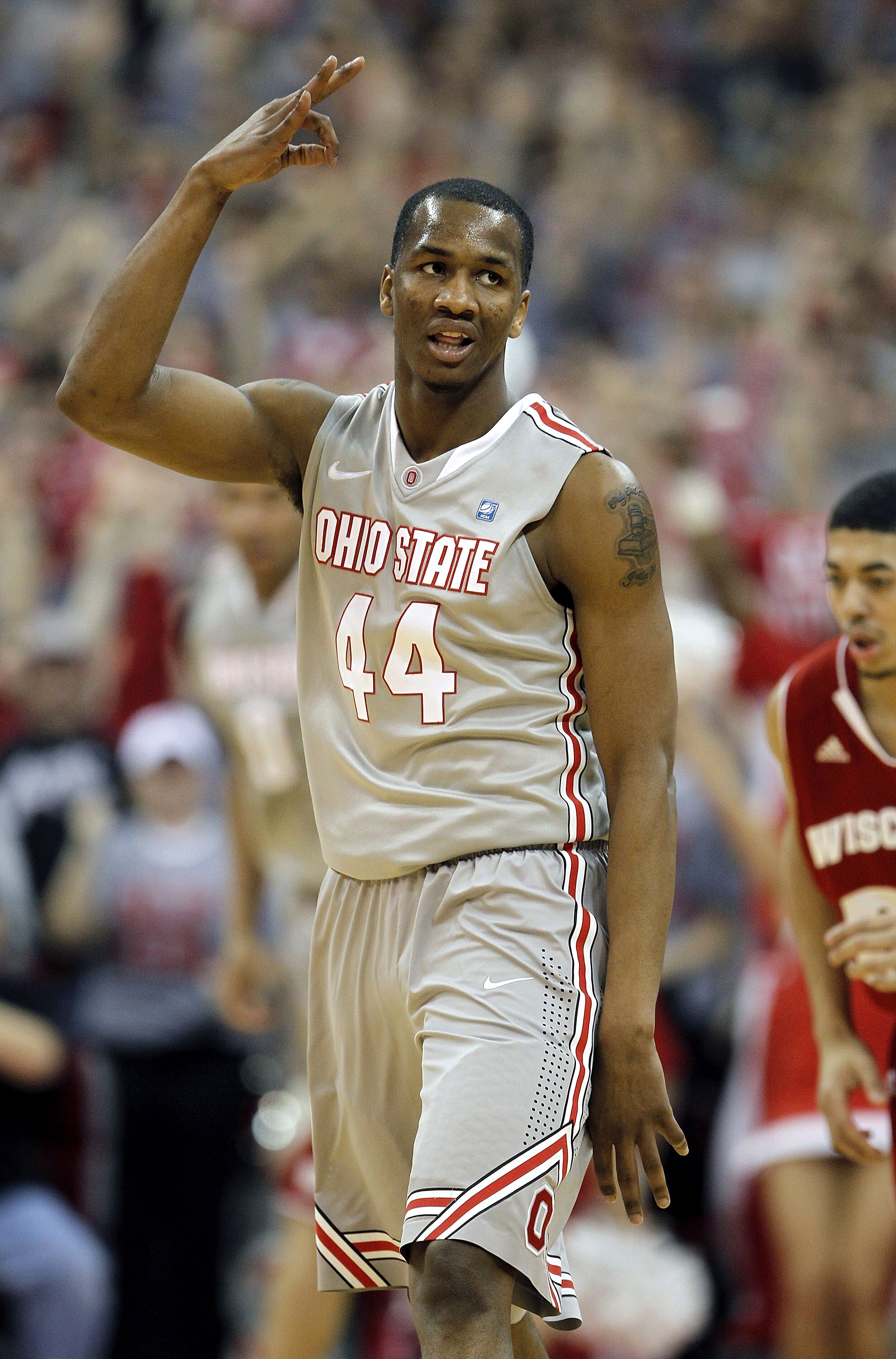 COLUMBUS, OH - MARCH 06:  William Buford #44 of the Ohio State Buckeyes reacts after a first half three point basket while playing the Wisconsin Badgers on March 6, 2011 at the Value City Arena in Columbus, Ohio.  (Photo by Gregory Shamus/Getty Images)