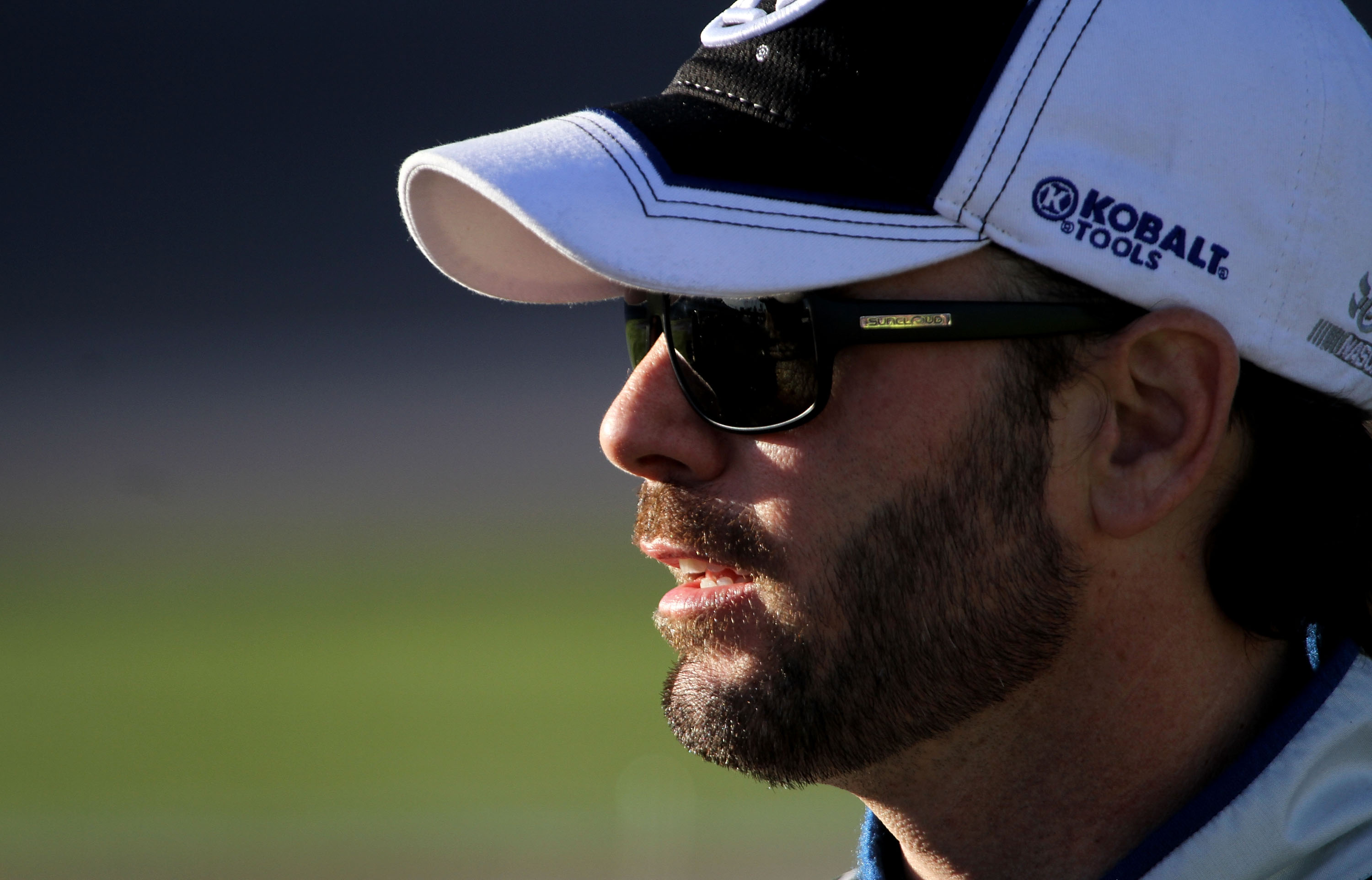 LAS VEGAS, NV - MARCH 04:  Jimmie Johnson, driver of the #48 Lowe's Chevrolet, stands on the grid during qualifying for the NASCAR Sprint Cup Series Kobalt Tools 400 at Las Vegas Motor Speedway on March 4, 2011 in Las Vegas, Nevada.  (Photo by Jerry Markl
