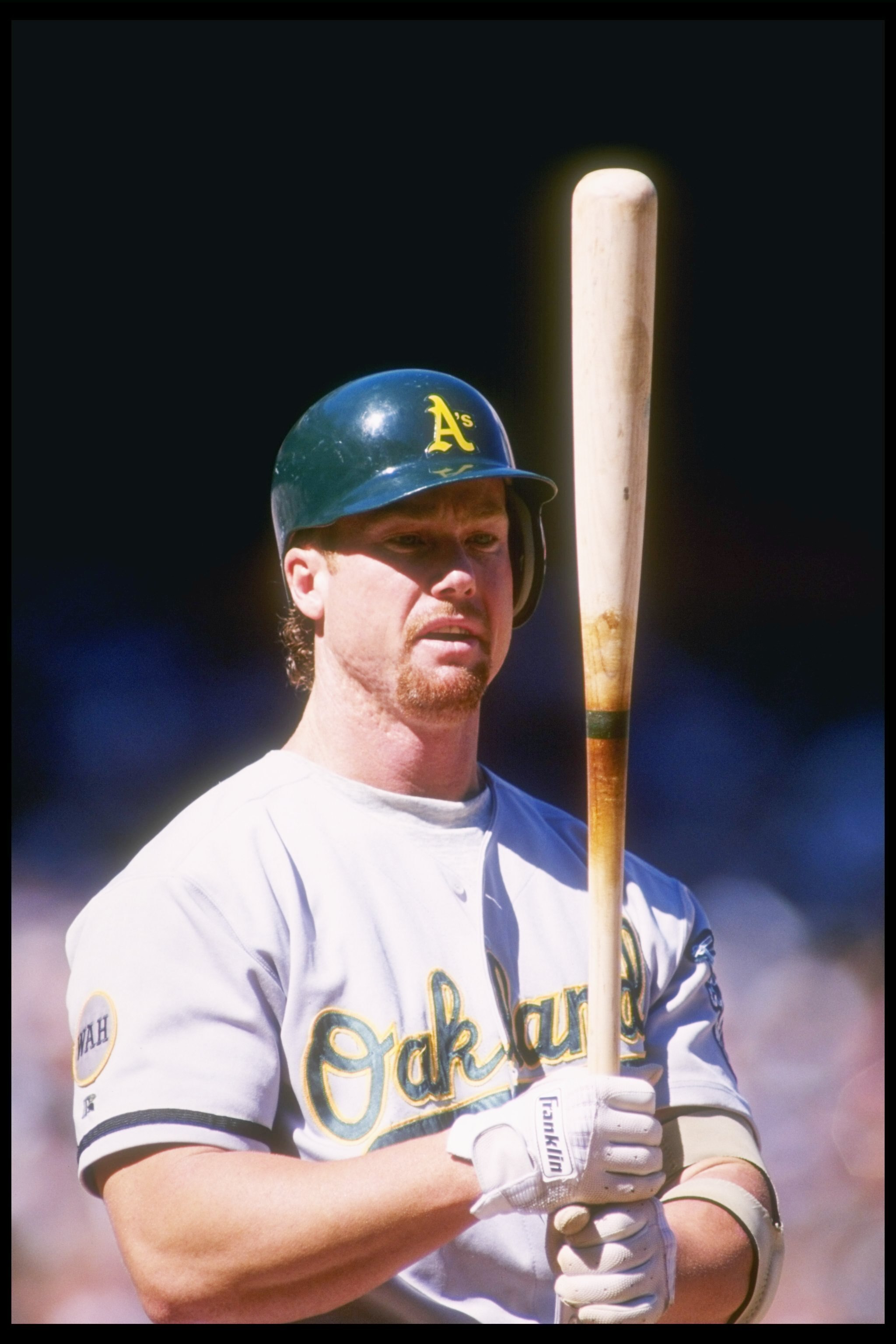 1 Oct 1995:  First baseman Mark McGwire of the Oakland Athletics prepares to take his turn at bat during a game against the California Angels at Anaheim Stadium in Anaheim, California.  The Angels won the game 8-2. Mandatory Credit: J.D. Cuban  /Allsport