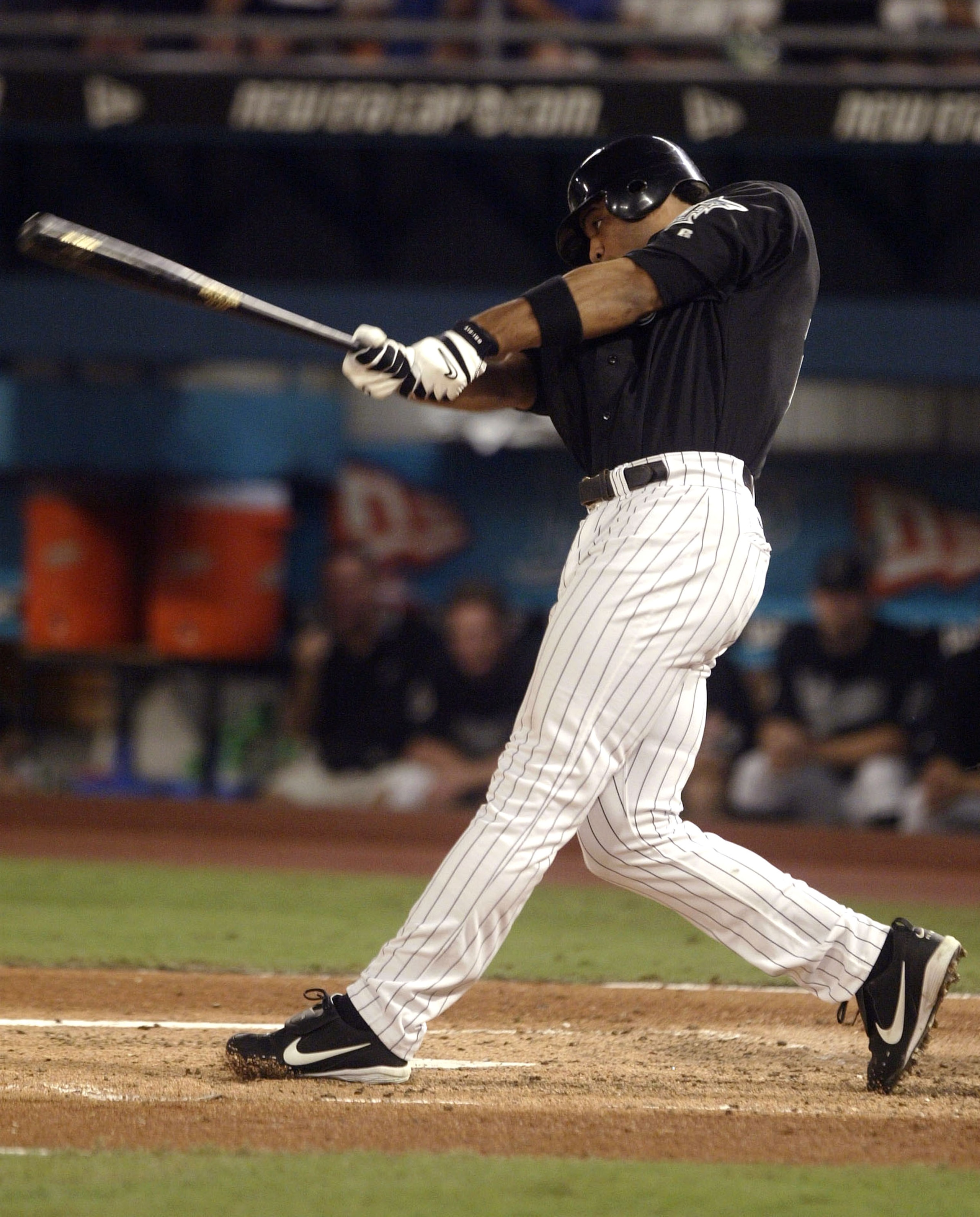 MIAMI - OCTOBER 22: Derrek Lee #25 of the Florida Marlins hits an RBI single to score teammate Jeff Conine #18 in the first inning against the New York Yankees during game four of the Major League Baseball World Series October 22, 2003 at Pro Player Stad MIAMI - OCTOBER 22: Derrek Lee #25 of the Florida Marlins hits an RBI single to score teammate Jeff Conine #18 in the first inning against the New York Yankees during game four of the Major League Baseball World Series October 22, 2003 at Pro Player Stad