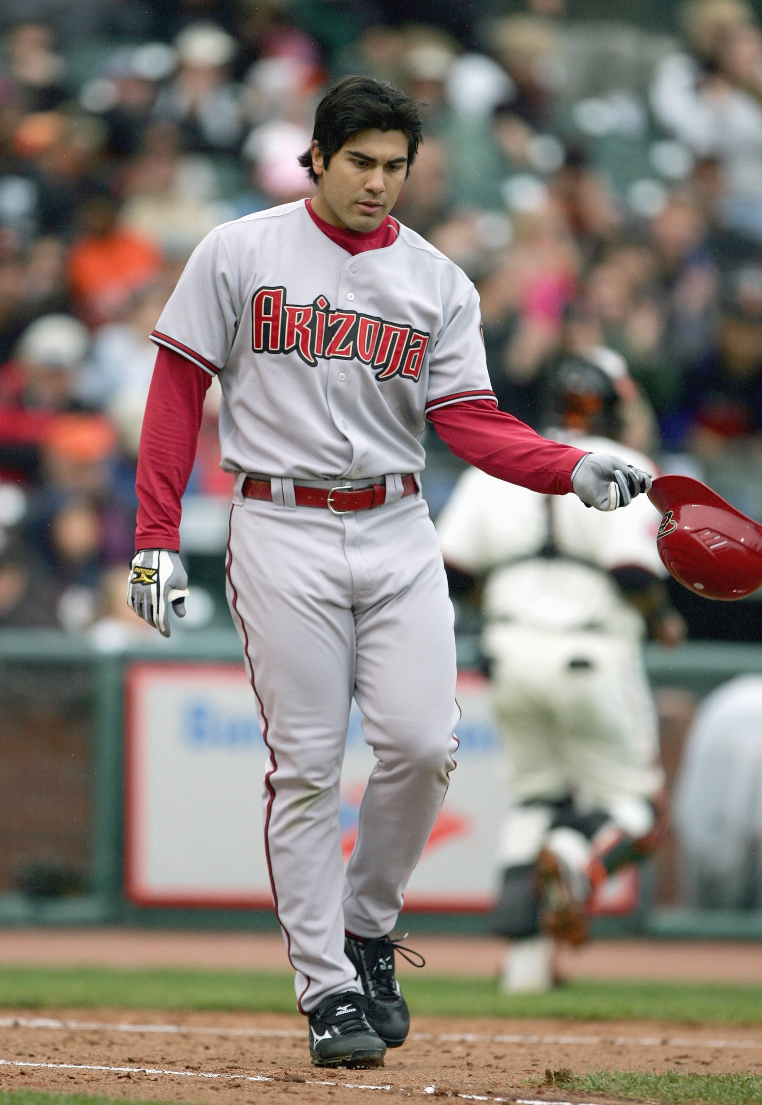 SAN FRANCISCO - APRIL 21: Carlos Quentin #7 of the Arizona Diamondbacks tosses his helmet against the San Francisco Giants during a Major League Baseball game on April 21, 2007 at AT&T Park in San Francisco, California. (Photo by Jed Jacobsohn/Getty Image SAN FRANCISCO - APRIL 21: Carlos Quentin #7 of the Arizona Diamondbacks tosses his helmet against the San Francisco Giants during a Major League Baseball game on April 21, 2007 at AT&T Park in San Francisco, California. (Photo by Jed Jacobsohn/Getty Image