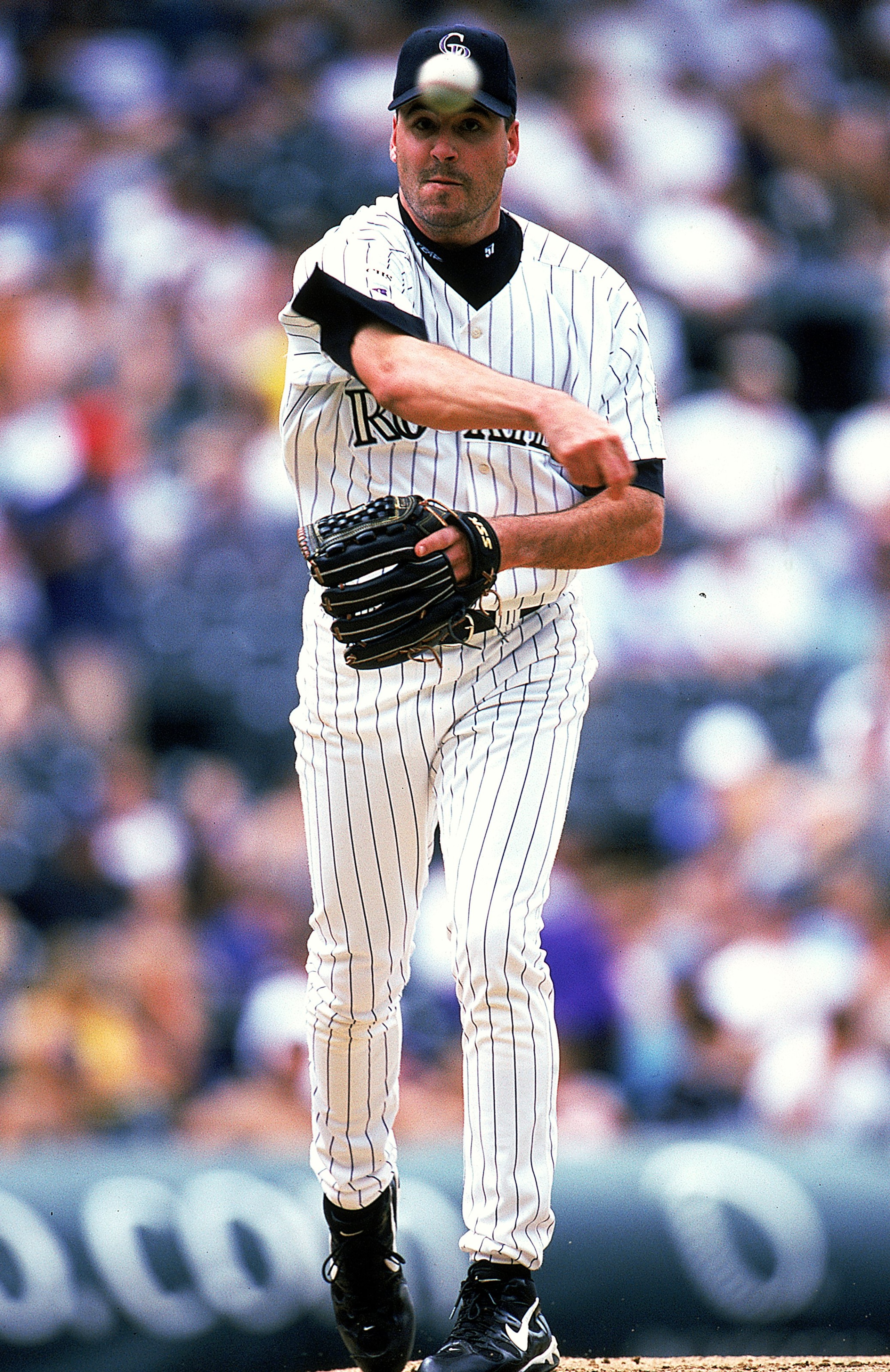 19 Aug 1999: Pitcher Darryl Kile #57 of the Colorado Rockies pitches the ball during the game against the Atlanta Braves at Coors Field in Denver, Colorado. The Braves defeated the Rockies 9-7. Mandatory Credit: Brian Bahr /Allsport 19 Aug 1999: Pitcher Darryl Kile #57 of the Colorado Rockies pitches the ball during the game against the Atlanta Braves at Coors Field in Denver, Colorado. The Braves defeated the Rockies 9-7. Mandatory Credit: Brian Bahr /Allsport