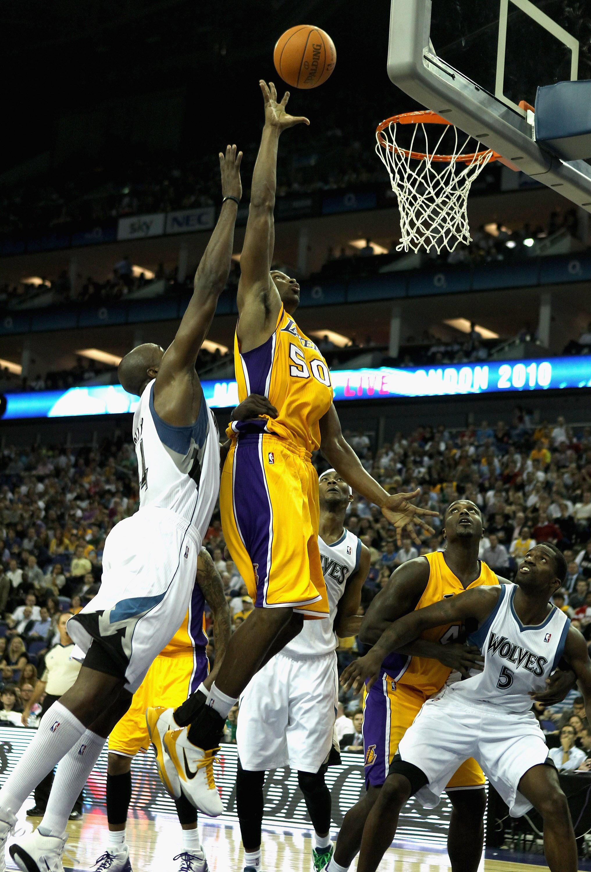 LONDON, ENGLAND - OCTOBER 04:  Theo Ratliff of the Los Angeles Lakers (C)  in action during the NBA Europe Live match between the Los Angeles Lakers and the Minnesota Timberwolves at the O2 arena on October 4, 2010 in London, England.  (Photo by Bryn Lenn