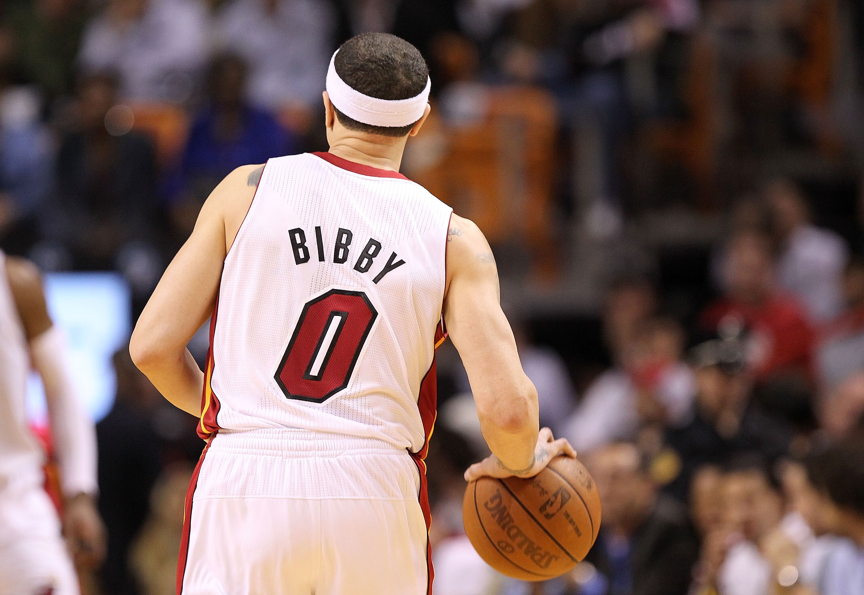 MIAMI, FL - MARCH 03:  New aquisition Mike Bibby #0 of the Miami Heat brings the ball up the floor during a game against the Orlando Magic at American Airlines Arena on March 3, 2011 in Miami, Florida. NOTE TO USER: User expressly acknowledges and agrees 