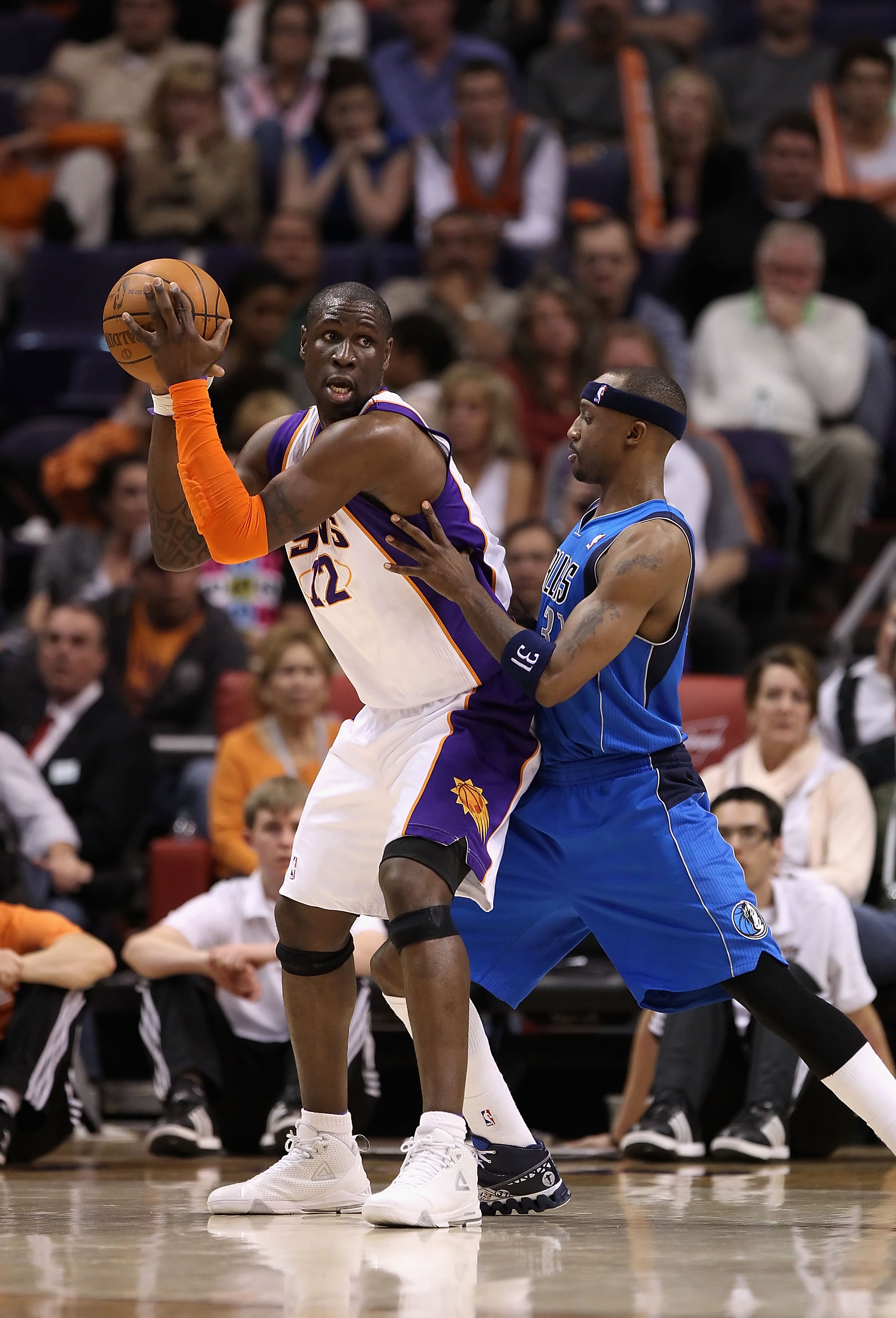 PHOENIX, AZ - FEBRUARY 17: Mickael Pietrus #12 of the Phoenix Suns looks to pass during the NBA game against the Dallas Mavericks at US Airways Center on February 17, 2011 in Phoenix, Arizona.  The Mavericks defeated the Suns 112-106.  NOTE TO USER: User 