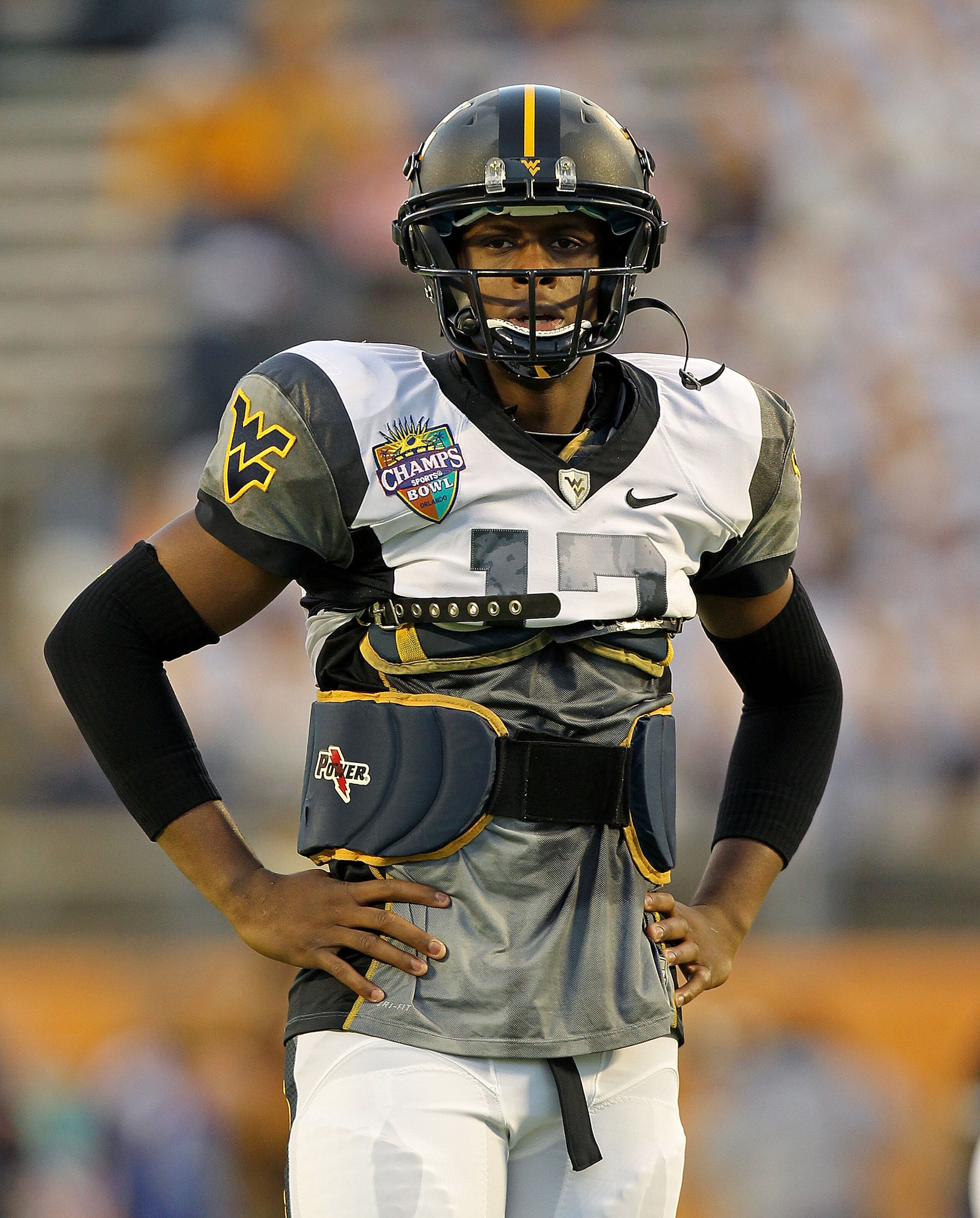 ORLANDO, FL - DECEMBER 28: Geno Smith #12 of the West Virginia Mountineers warms up during the Champs Sports Bowl against the North Carolina State Wolfpack at Florida Citrus Bowl Stadium on December 28, 2010 in Orlando, Florida. (Photo by Mike Ehrmann/G ORLANDO, FL - DECEMBER 28: Geno Smith #12 of the West Virginia Mountineers warms up during the Champs Sports Bowl against the North Carolina State Wolfpack at Florida Citrus Bowl Stadium on December 28, 2010 in Orlando, Florida. (Photo by Mike Ehrmann/G