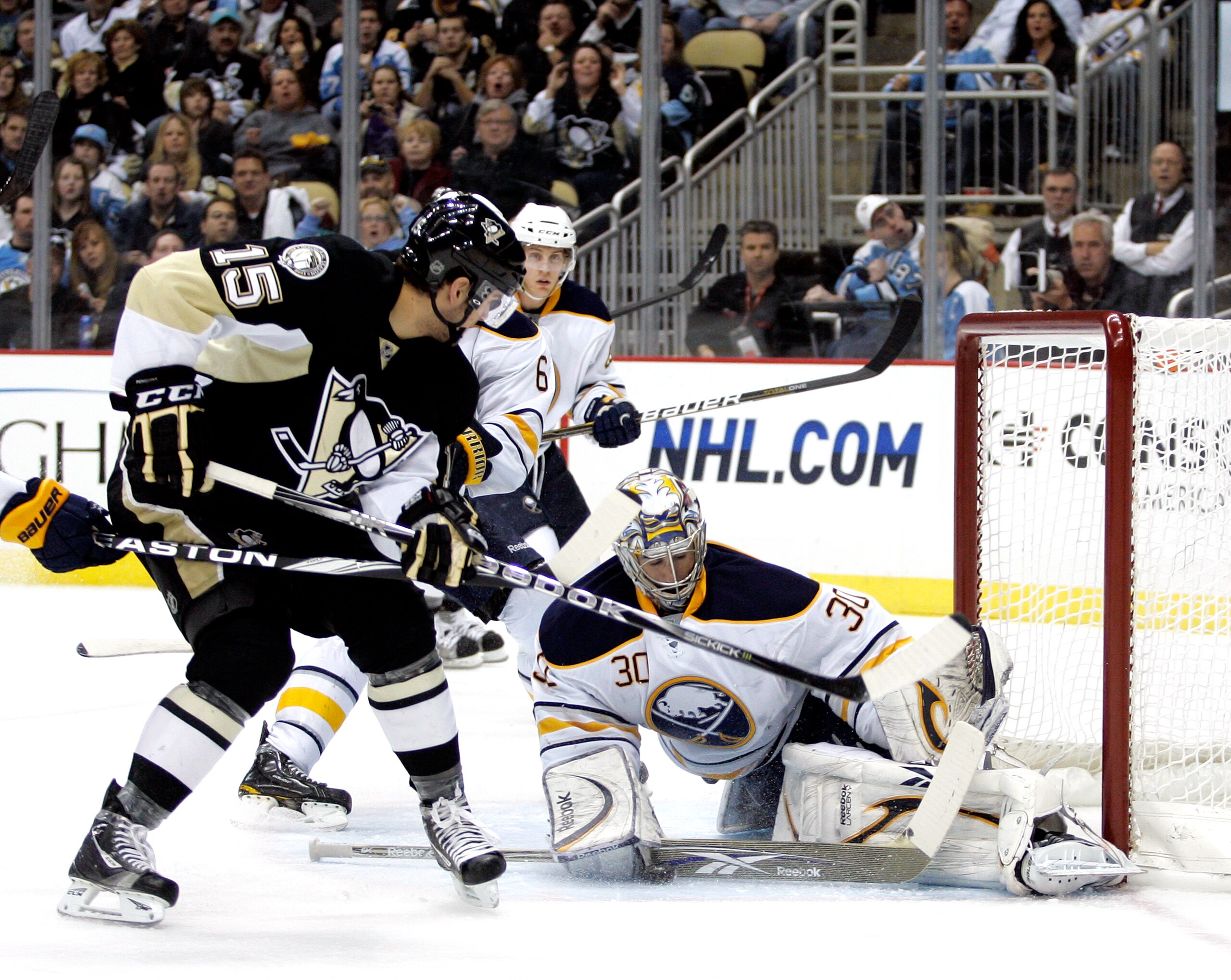 PITTSBURGH, PA - MARCH 08:  Ryan Miller #30 of the Buffalo Sabres makes a save on Dustin Jeffrey #15 of the Pittsburgh Penguins at Consol Energy Center on March 8, 2011 in Pittsburgh, Pennsylvania.  (Photo by Justin K. Aller/Getty Images)