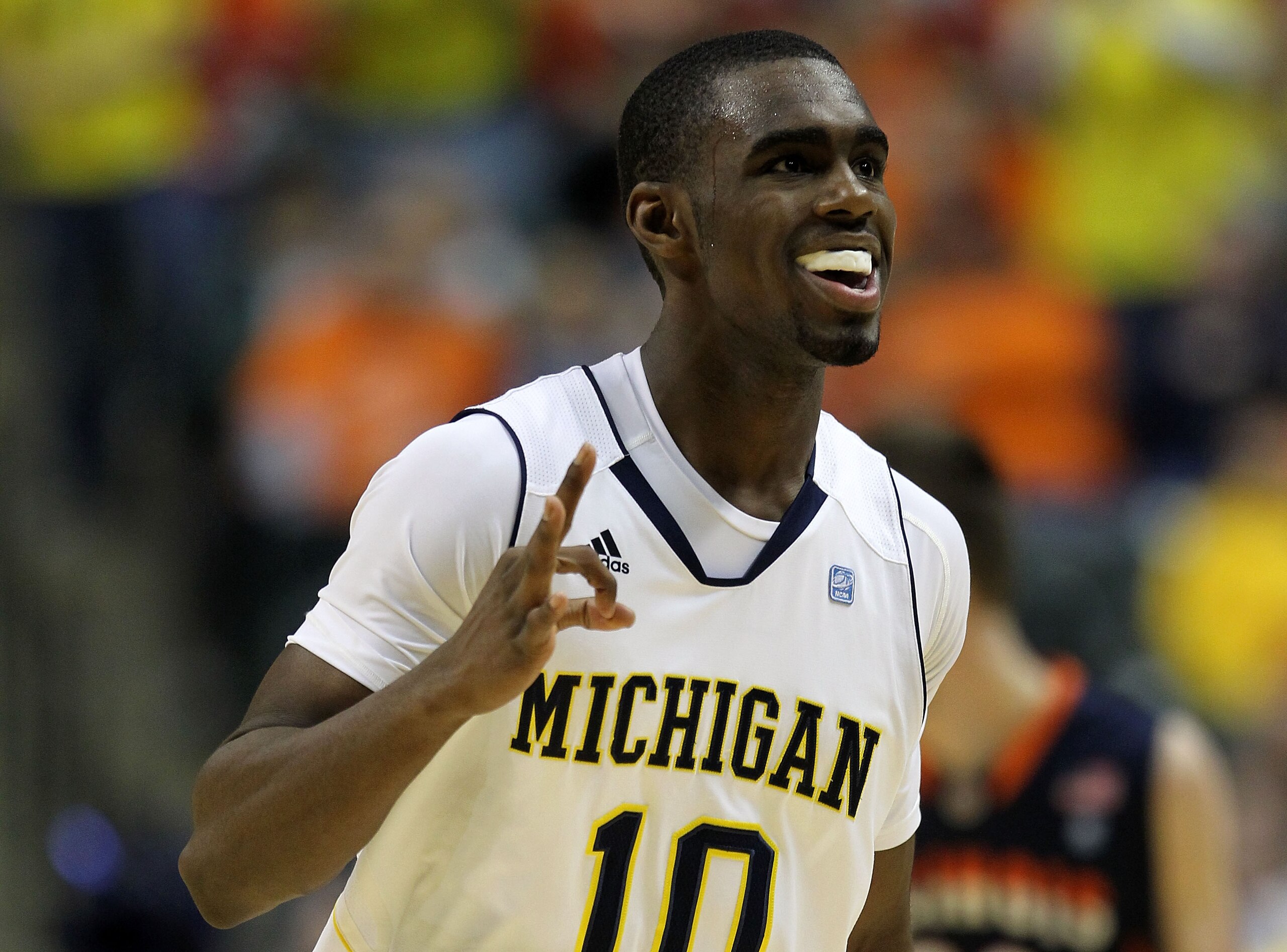 INDIANAPOLIS, IN - MARCH 11: Tim Hardaway Jr. #10 of the Michigan Wolverines celebrates after he made a 3-point shot in the second half against the Illinois Fighting Illini during the quarterfinals of the 2011 Big Ten Men's Basketball Tournament at Conse INDIANAPOLIS, IN - MARCH 11: Tim Hardaway Jr. #10 of the Michigan Wolverines celebrates after he made a 3-point shot in the second half against the Illinois Fighting Illini during the quarterfinals of the 2011 Big Ten Men's Basketball Tournament at Conse