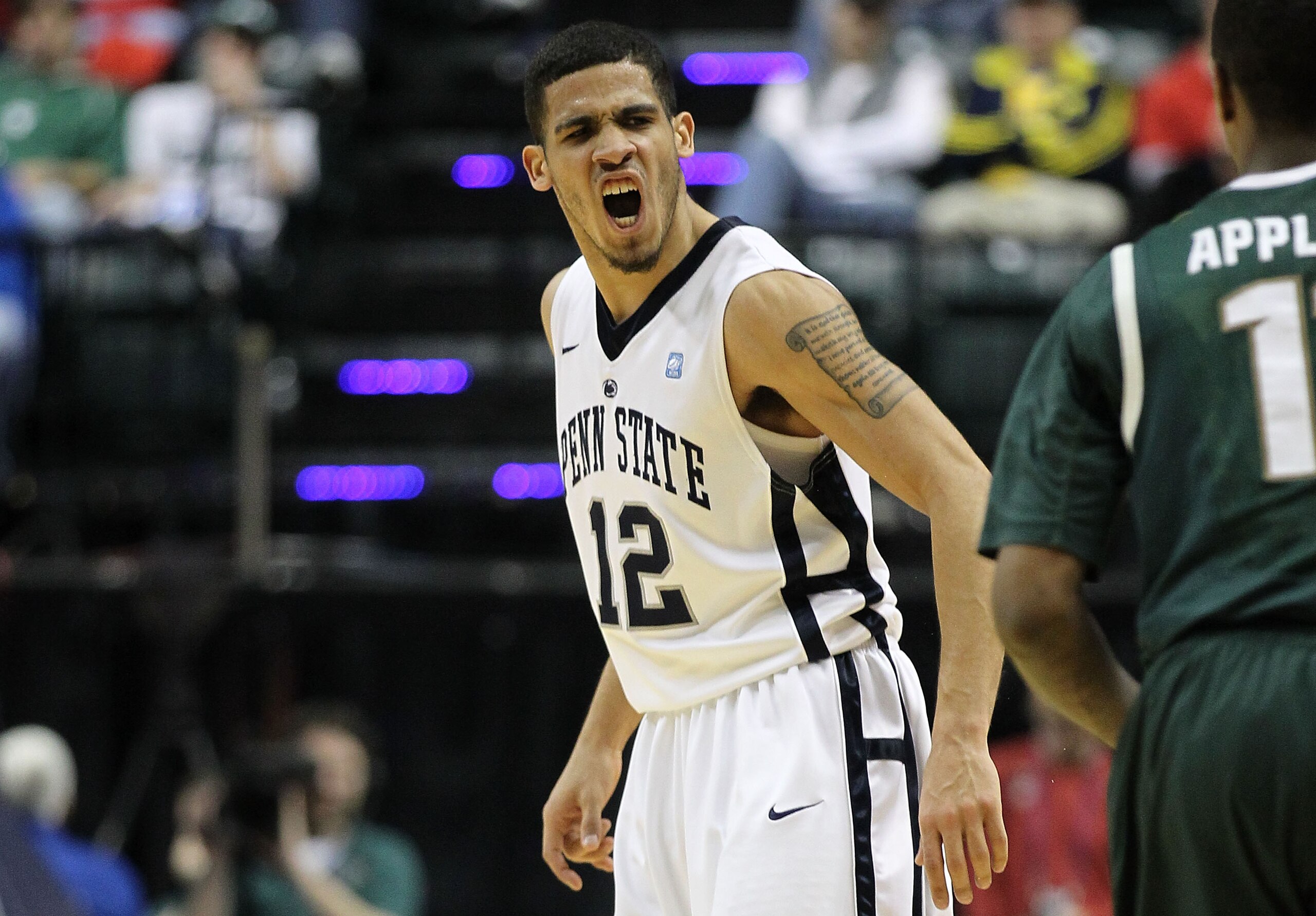INDIANAPOLIS, IN - MARCH 12: Talor Battle #12 of the Penn State Nittany Lions reacts towards the Michigan State Spartans bench during the semifinals of the 2011 Big Ten Men's Basketball Tournament at Conseco Fieldhouse on March 12, 2011 in Indianapolis, INDIANAPOLIS, IN - MARCH 12: Talor Battle #12 of the Penn State Nittany Lions reacts towards the Michigan State Spartans bench during the semifinals of the 2011 Big Ten Men's Basketball Tournament at Conseco Fieldhouse on March 12, 2011 in Indianapolis,