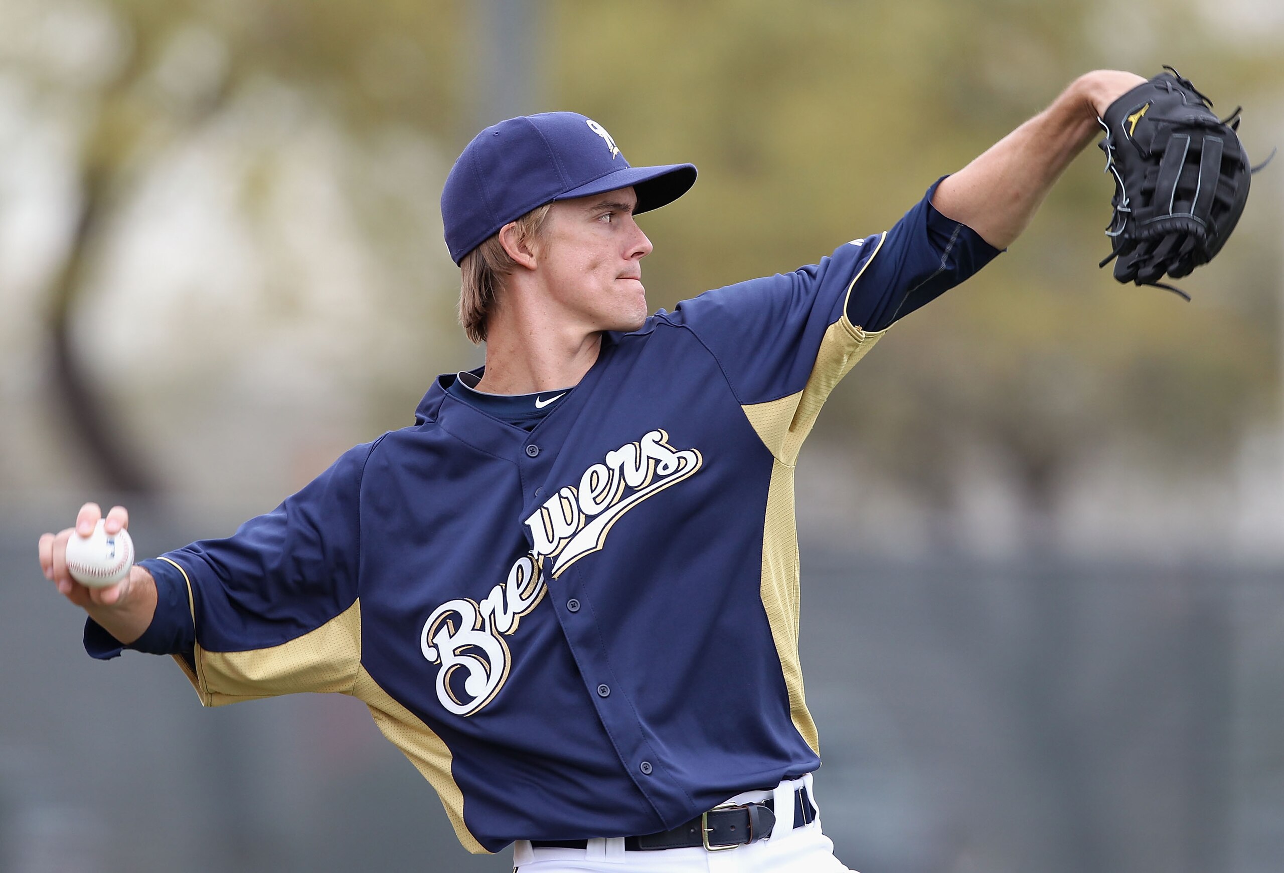 PHOENIX, AZ - FEBRUARY 18: Pitcher Zack Greinke #13 of the Milwaukee Brewers warms up during a MLB spring training practice at Maryvale Baseball Park on February 18, 2011 in Phoenix, Arizona. (Photo by Christian Petersen/Getty Images) PHOENIX, AZ - FEBRUARY 18: Pitcher Zack Greinke #13 of the Milwaukee Brewers warms up during a MLB spring training practice at Maryvale Baseball Park on February 18, 2011 in Phoenix, Arizona. (Photo by Christian Petersen/Getty Images)