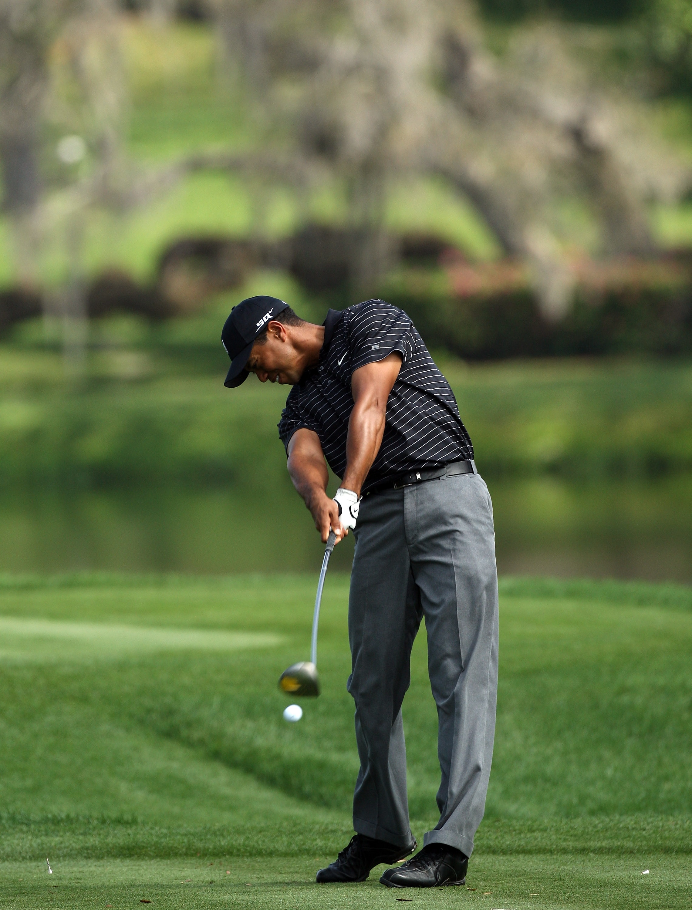 ORLANDO, FLORIDA - MARCH 12:  Tiger Woods of the USA (10th frame in sequence) at impact as he hits his tee shot to the 16th hole during the pro-am for the 2008 Arnold Palmer Invitational presented by Mastercard at the Bay Hill Golf Club, on March 12, 2008
