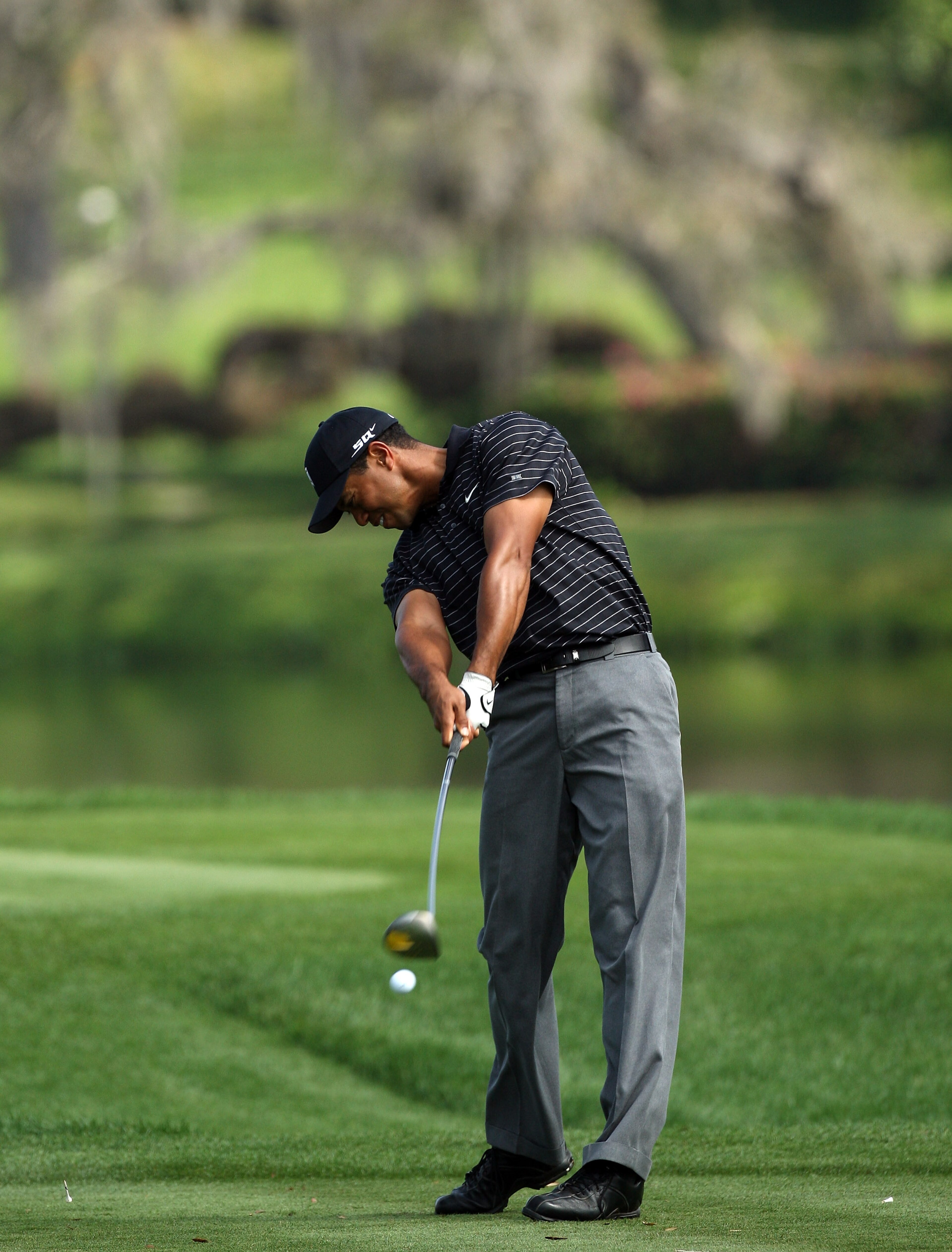 ORLANDO, FLORIDA - MARCH 12:  Tiger Woods of the USA (10th frame in sequence) at impact as he hits his tee shot to the 16th hole during the pro-am for the 2008 Arnold Palmer Invitational presented by Mastercard at the Bay Hill Golf Club, on March 12, 2008