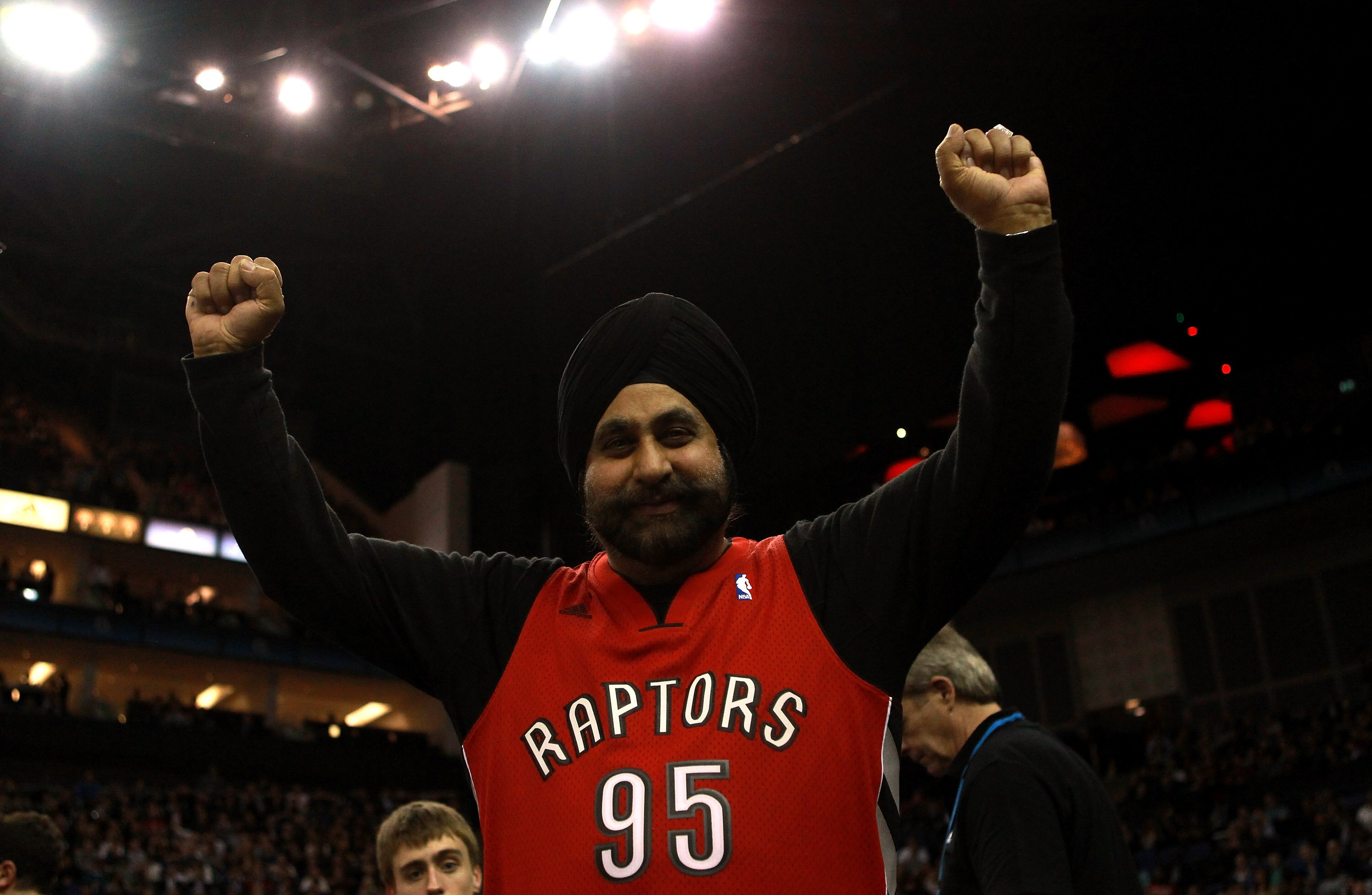 LONDON, ENGLAND - MARCH 04:  A Raptors fans cheers on his team during the NBA match between New Jersey Nets and the Toronto Raptors at the O2 Arena on March 4, 2011 in London, England. NOTE TO USER: User expressly acknowledges and agrees that, by download
