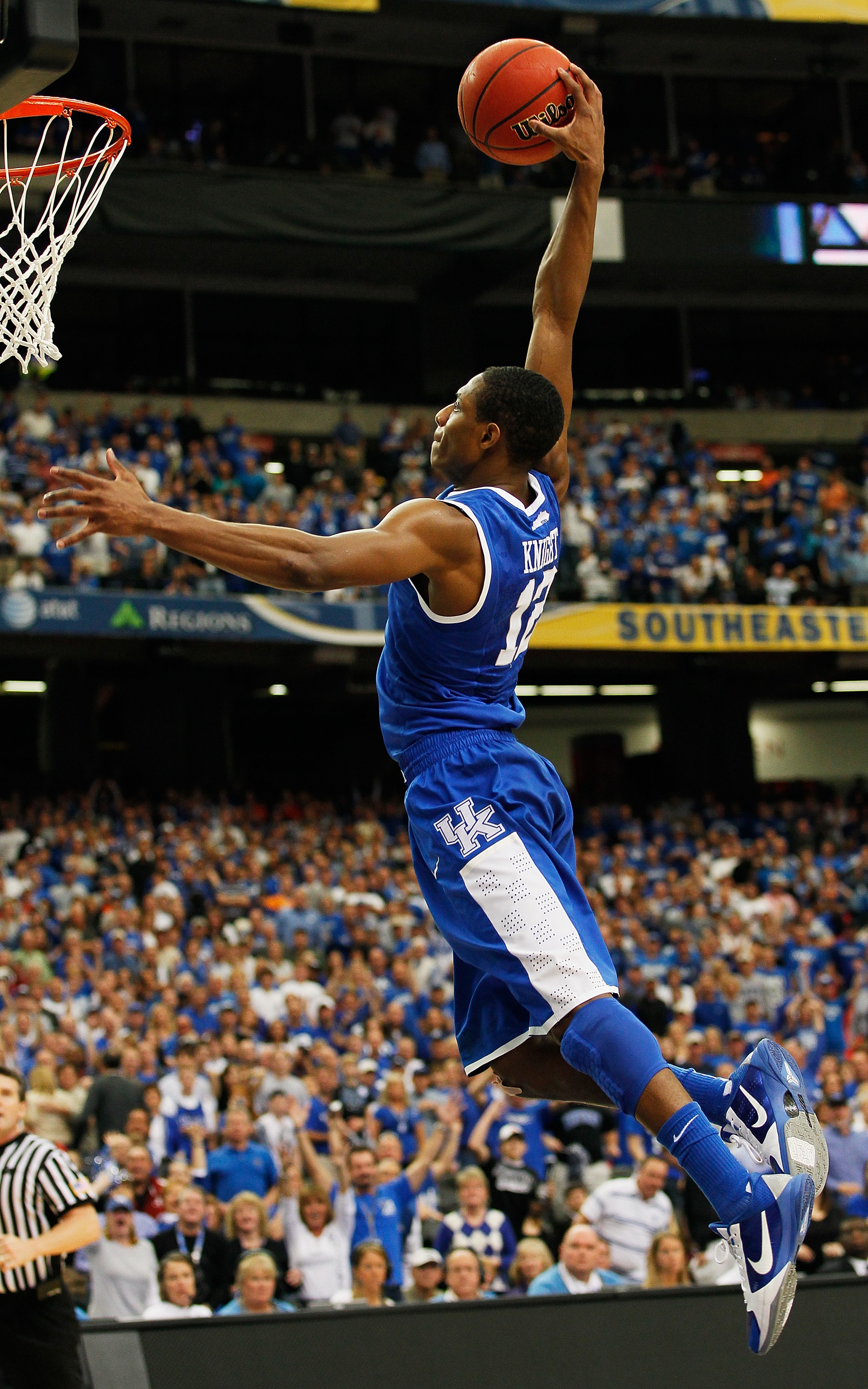 ATLANTA, GA - MARCH 13:  Brandon Knight #12 of the Kentucky Wildcats dunks on the Florida Gators during the championship game of the SEC Men's Basketball Tournament at Georgia Dome on March 13, 2011 in Atlanta, Georgia.  (Photo by Kevin C. Cox/Getty Image