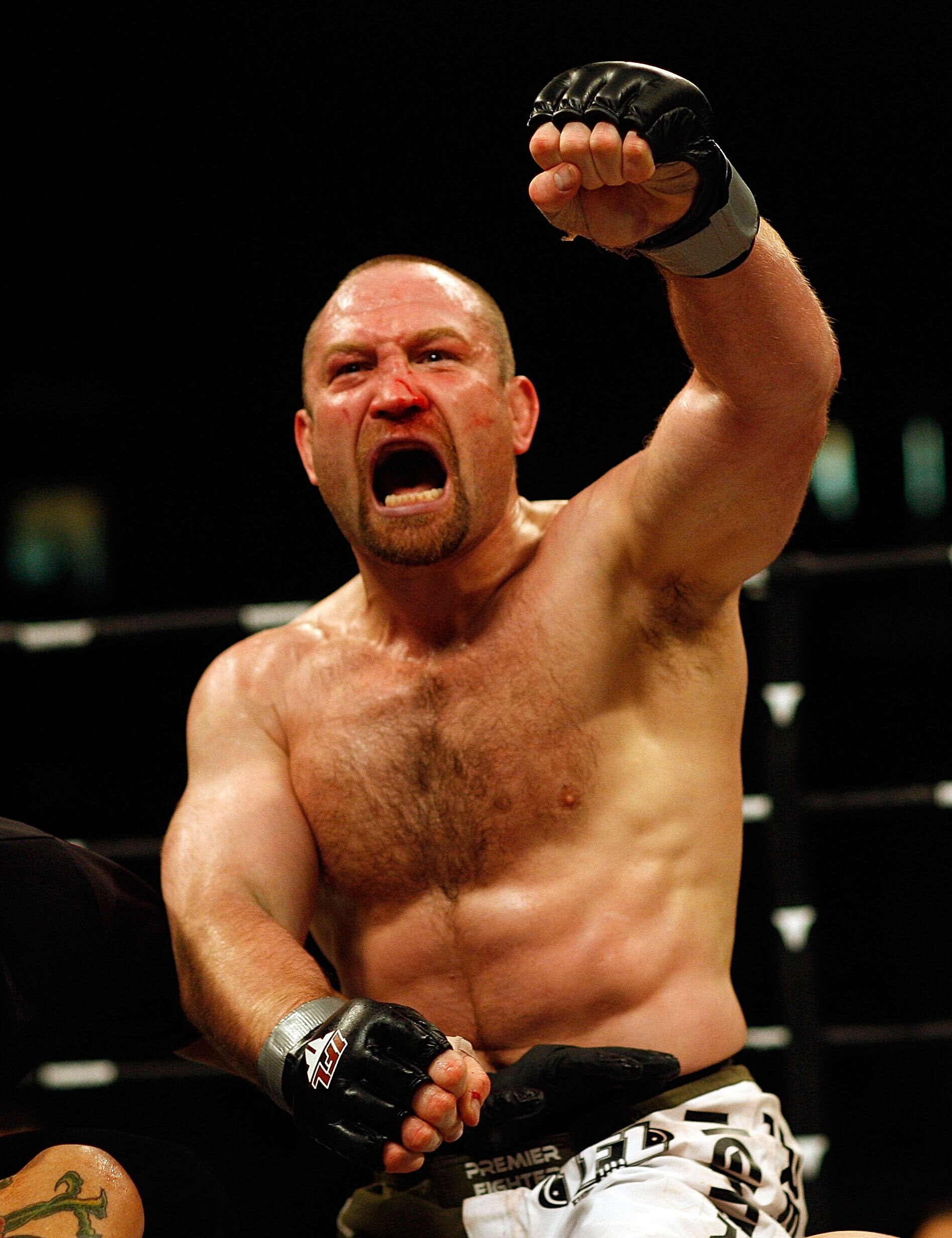 EAST RUTHERFORD, NJ - APRIL 04:  Vladimir Matyushenko in the green and white trunks of Midwest Combat celebrates defeating Jamal Patterson of the Renzo Gracie Jiu-Jitsu in the International Fighting League match at the Izod Center on April 4, 2008 in East