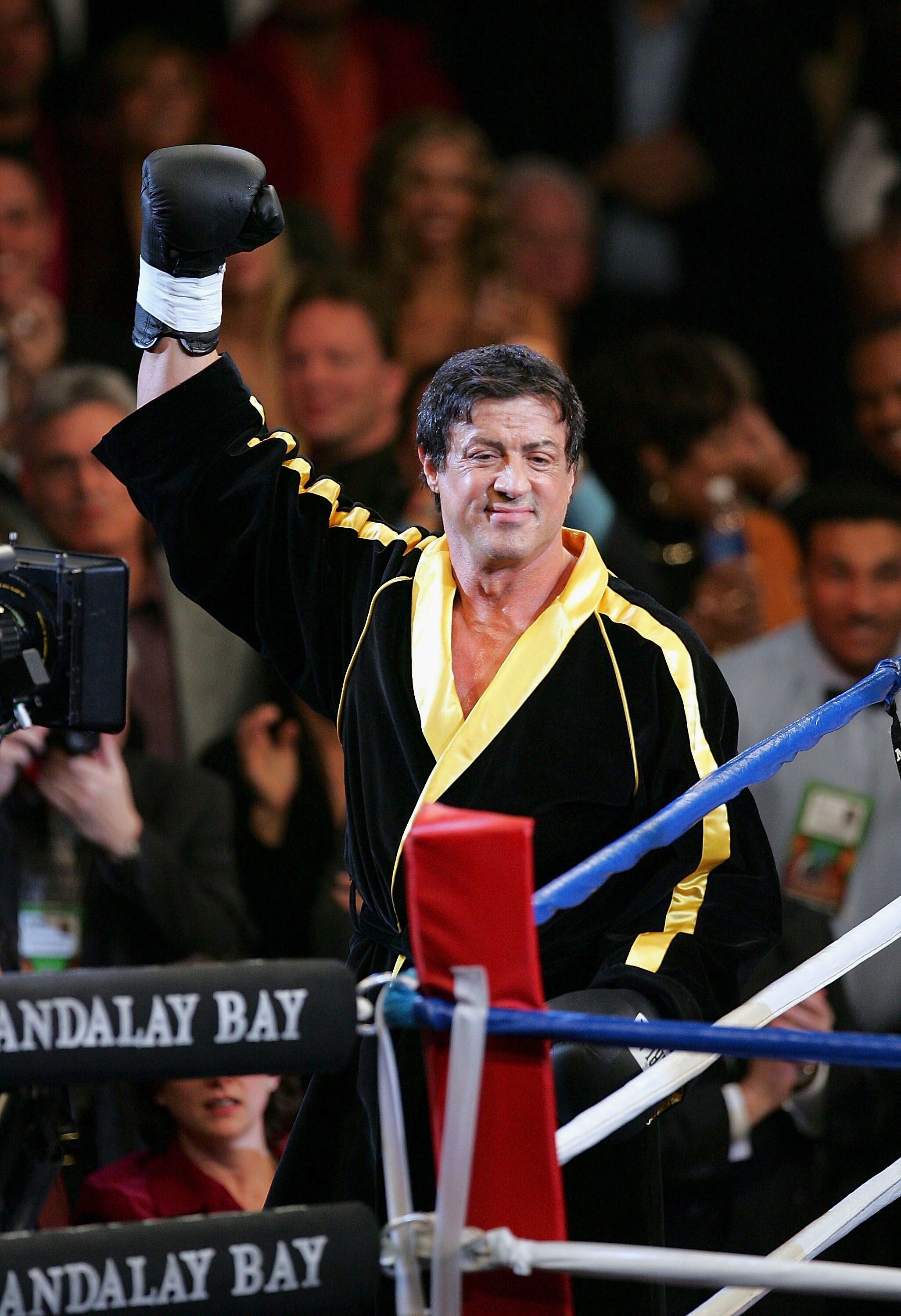 LAS VEGAS - DECEMBER 03:  Actor Sylvester Stallone waves to the crowd as scenes from the film 'Rocky VI' are filmed before the start of the Bernard Hopkins and Jermain Taylor fight at the Mandalay Bay Events Center on December 3, 2005 in Las Vegas, Nevada