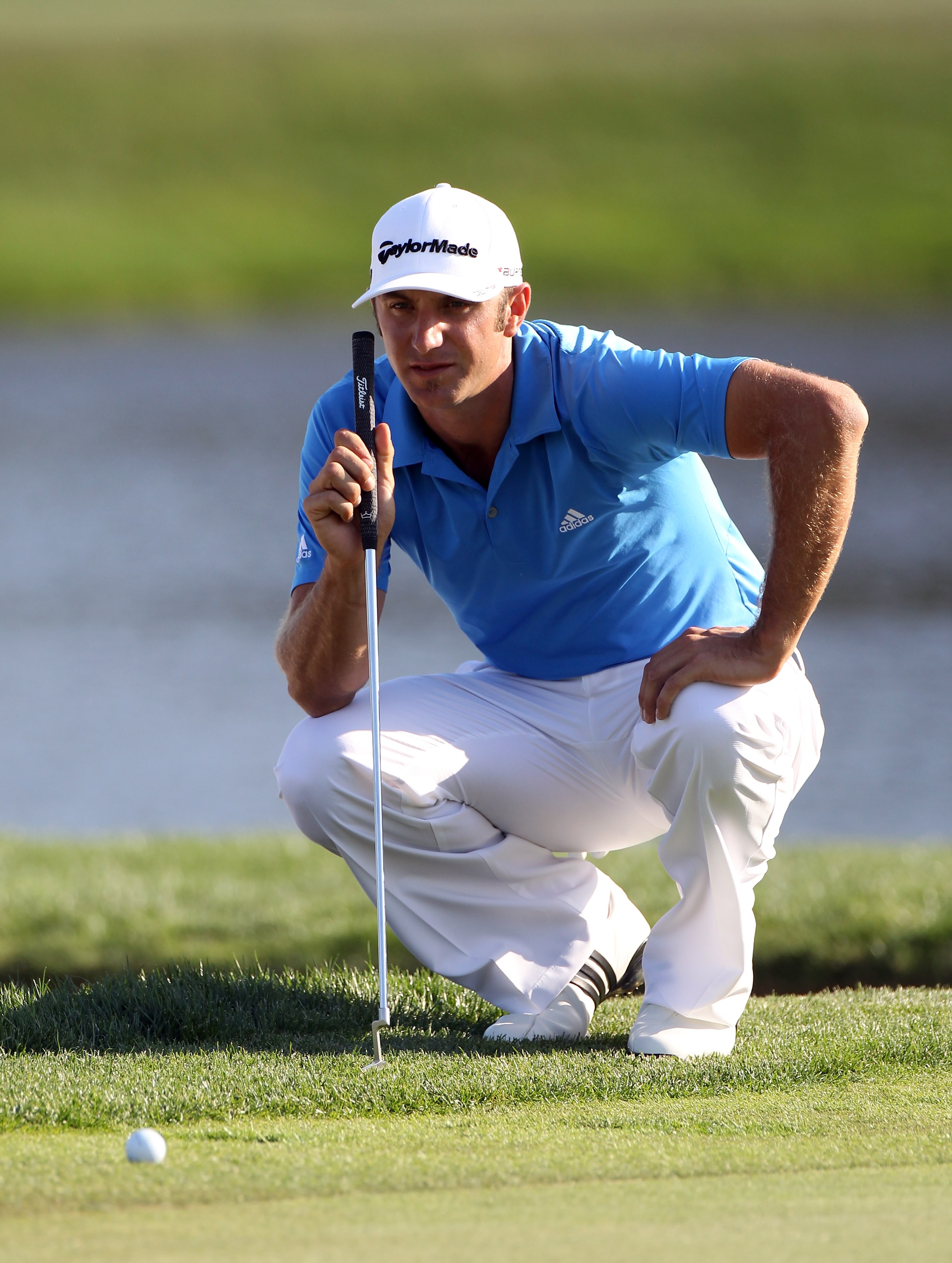 ORLANDO, FL - MARCH 24:  Dustin Johnson plays a shot on the 18th hole during the first round of the Arnold Palmer Invitational presented by MasterCard at the Bay Hill Club and Lodge on March 24, 2011 in Orlando, Florida.  (Photo by Sam Greenwood/Getty Ima