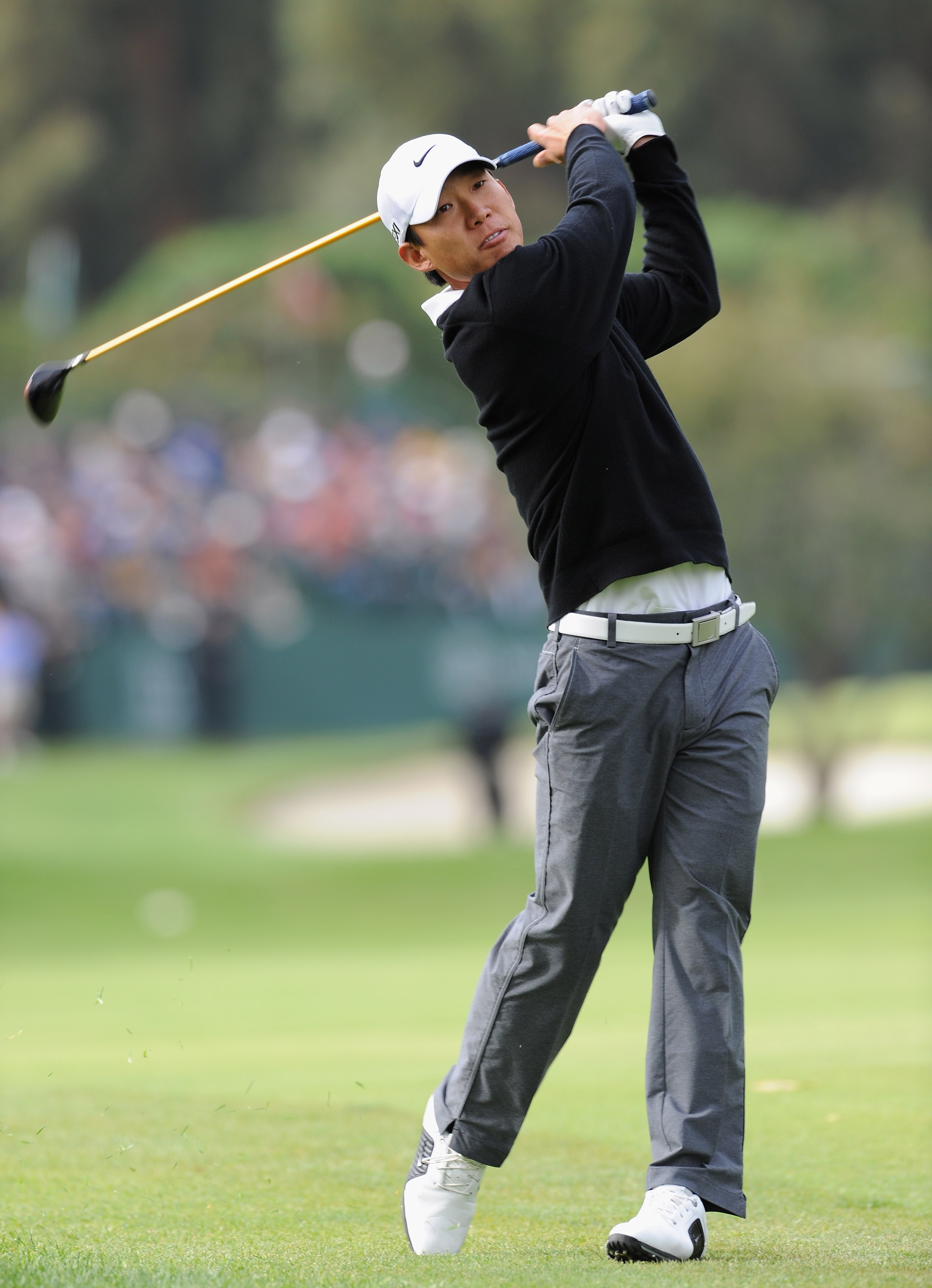 PACIFIC PALISADES, CA - FEBRUARY 18:  Anthony Kim plays his approach shot on the 11th hole during the second round of the Northern Trust Open at Riviera Country Club on February 18, 2011 in Pacific Palisades, California.  (Photo by Stuart Franklin/Getty I