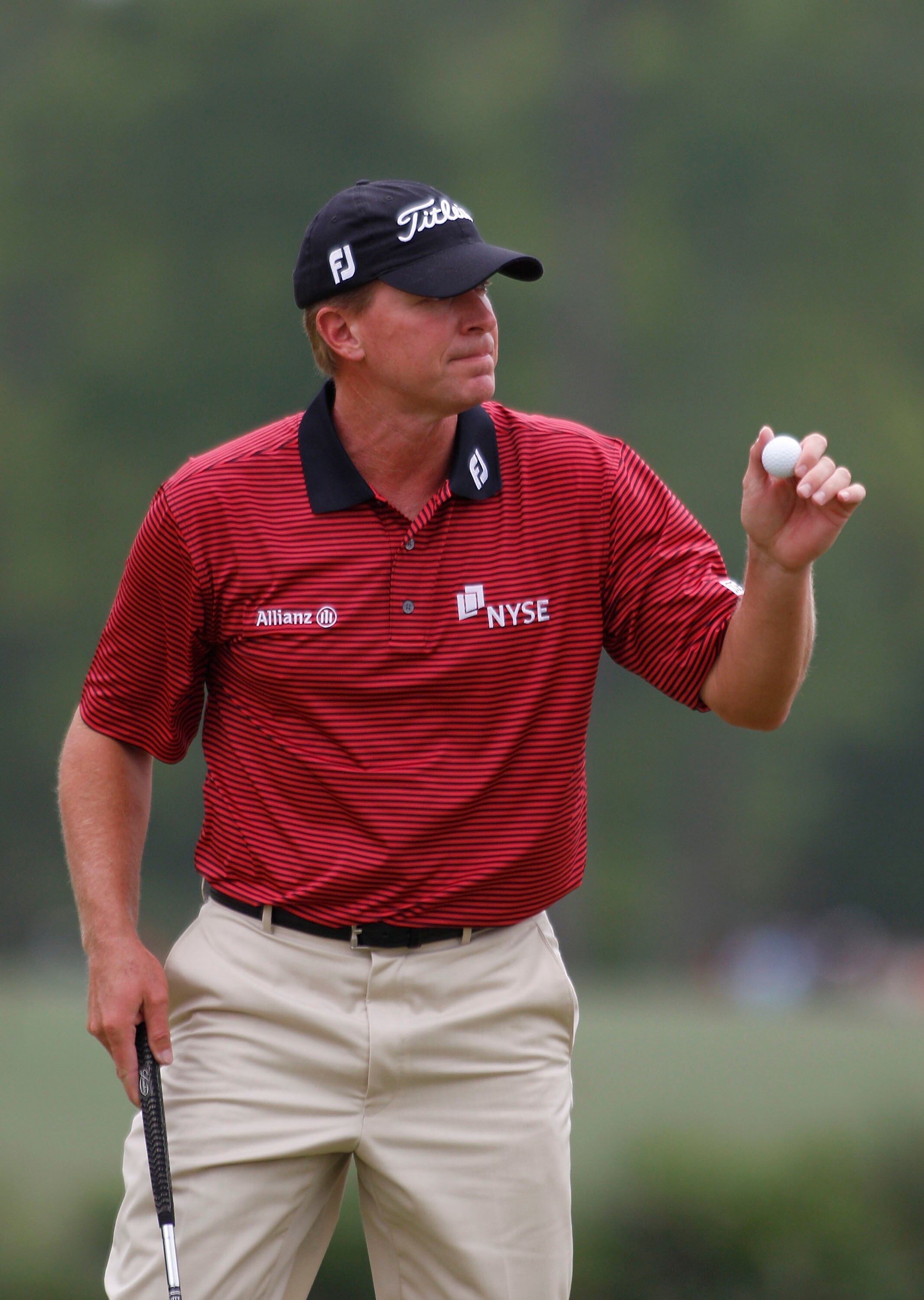 HUMBLE, TX - APRIL 02:  Steve Stricker holds up his ball after making a birdie on the second hole during the third round of the Shell Houston Open at Redstone Golf Club on April 2, 2011 in Humble, Texas.  (Photo by Michael Cohen/Getty Images)