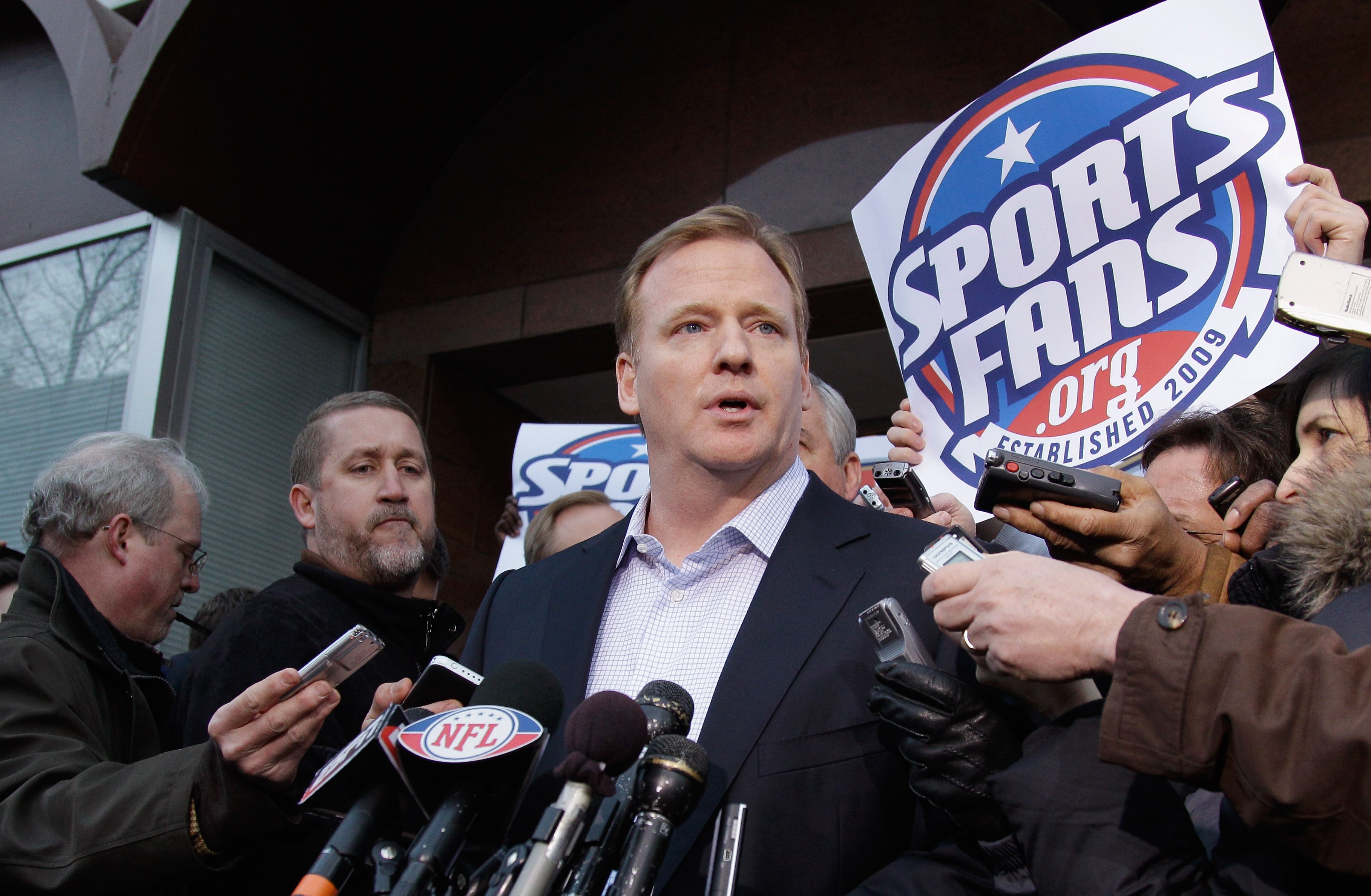 WASHINGTON, DC - MARCH 11:   NFL Commissioner Roger Goodell talks with the media outside the Federal Mediation and Conciliation Service building March 11, 2011 in Washington, DC. The NFLPA has filed for decertification and will no longer be the exclusive